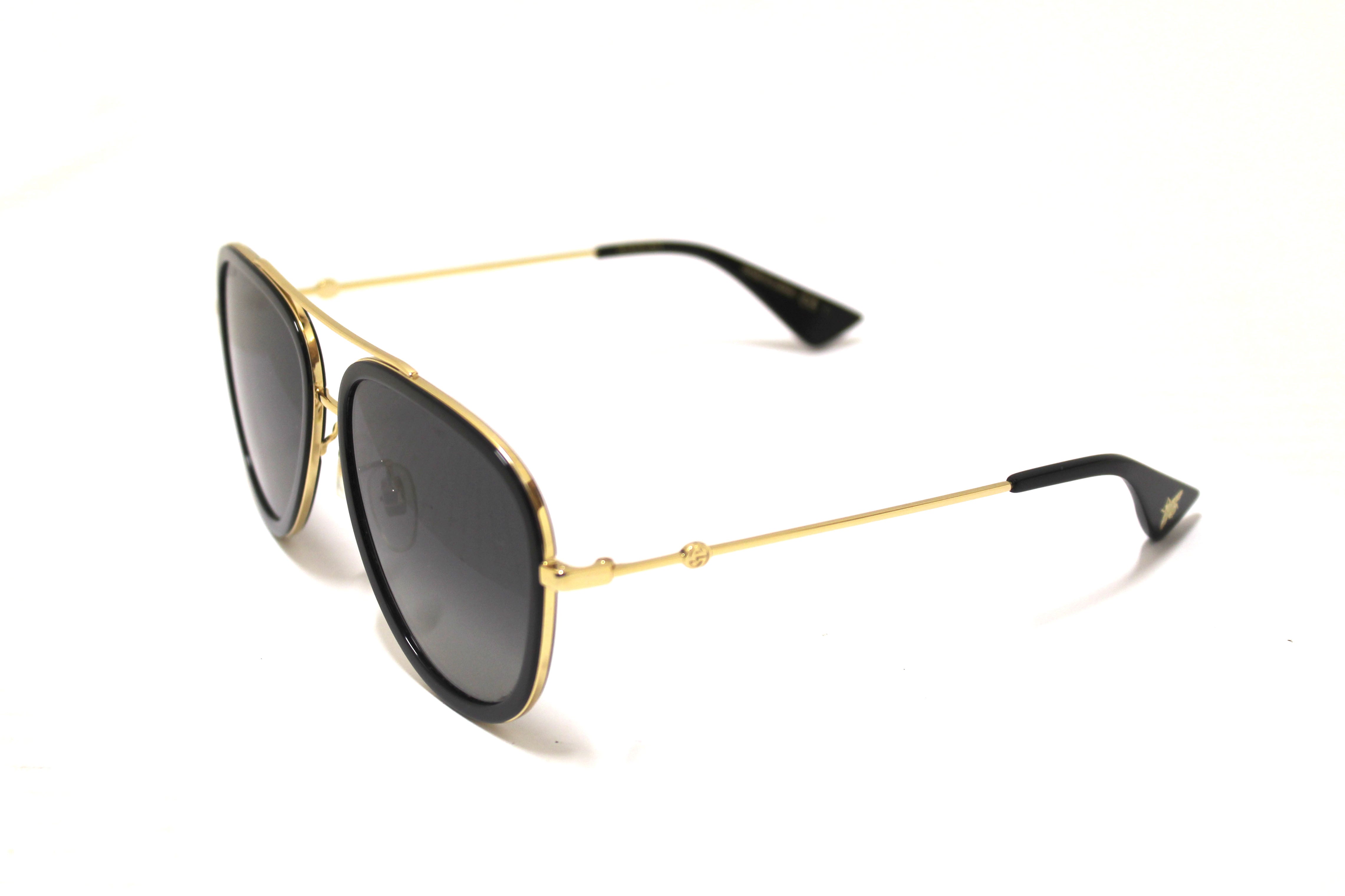 Authentic Gucci Black and Gold Sunglasses GG0062S