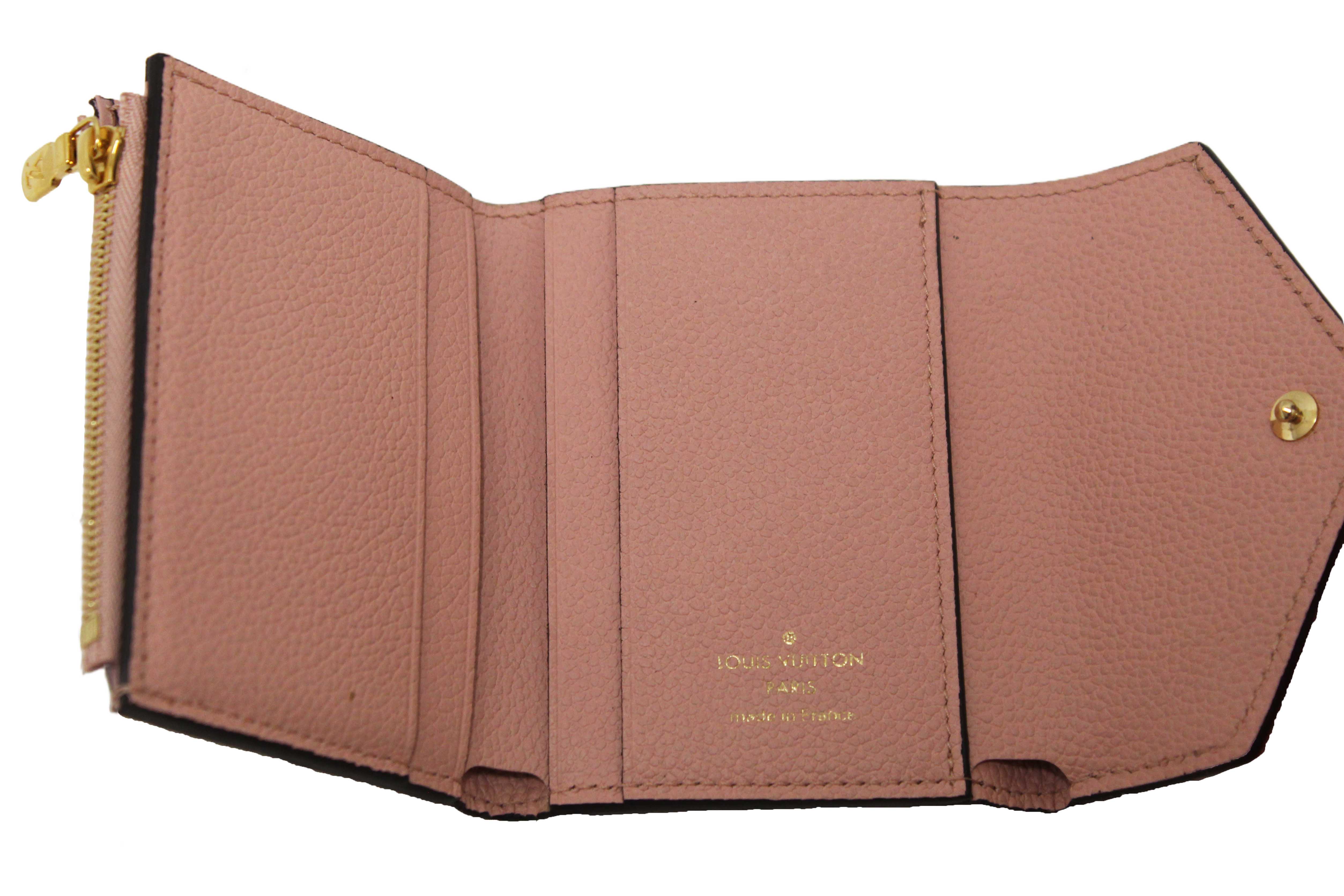 Authentic Louis Vuitton Pink Monogram Empreinte Leather Zoe Wallet