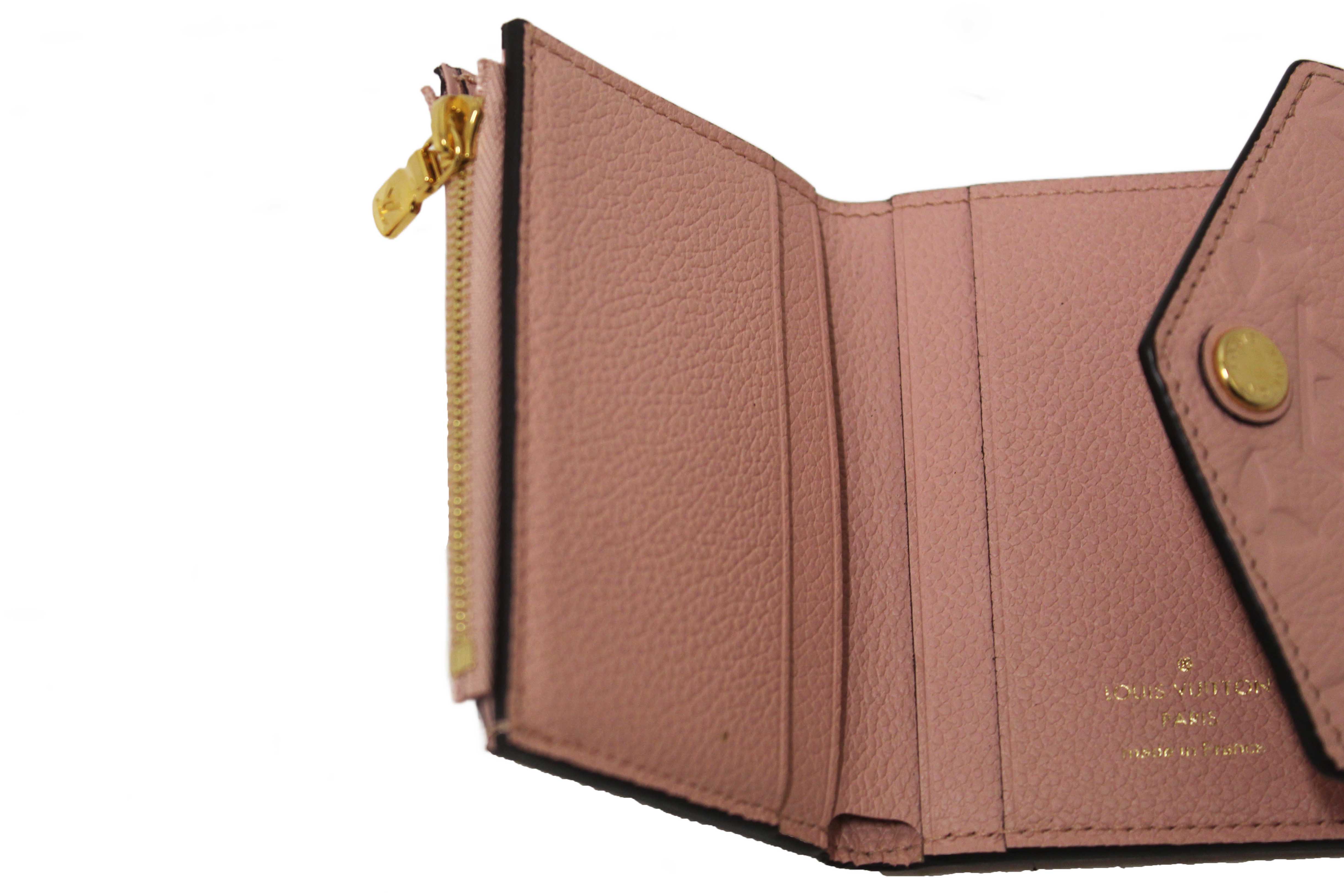 Authentic Louis Vuitton Pink Monogram Empreinte Leather Zoe Wallet