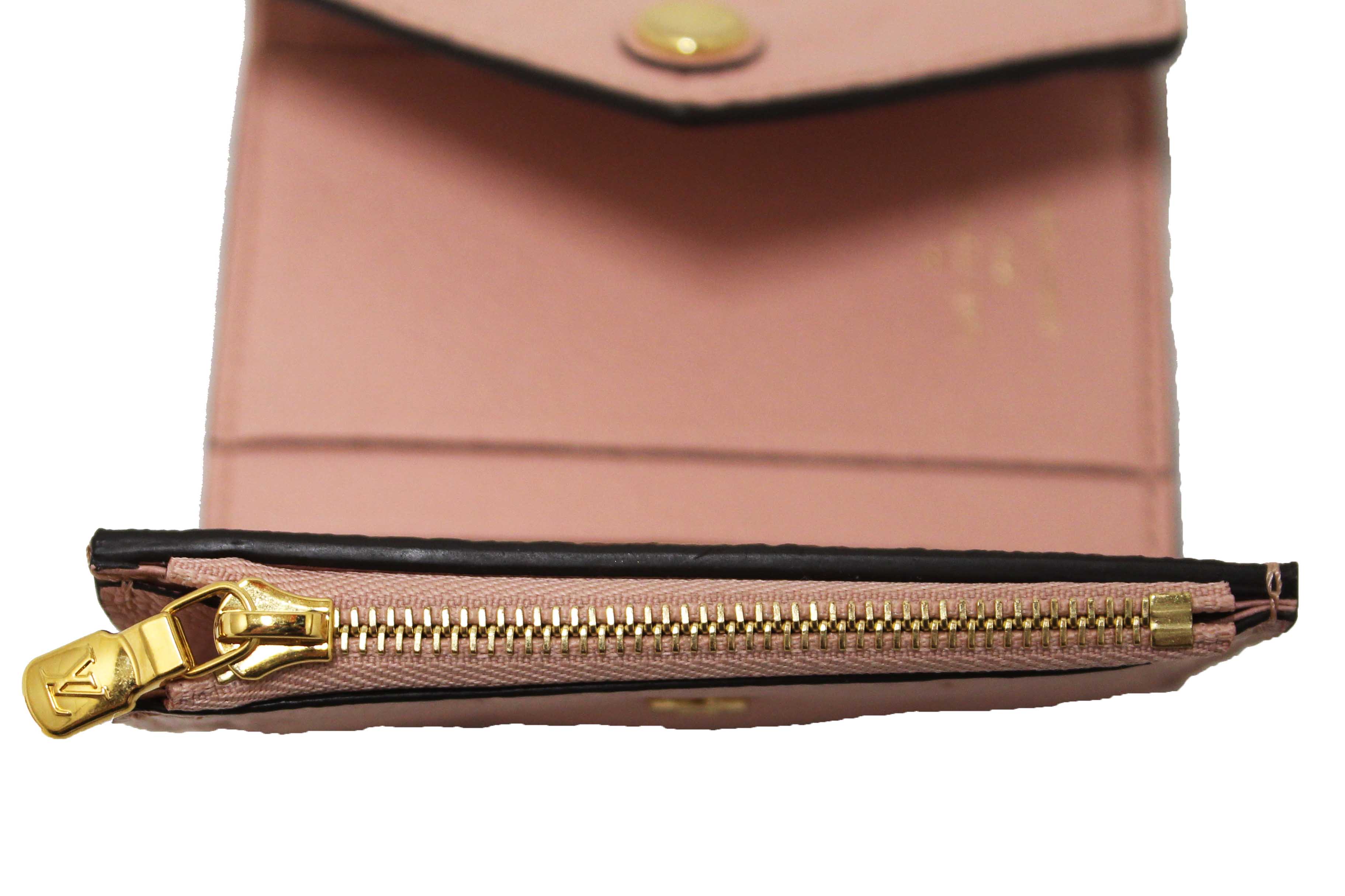 Authentic Louis Vuitton Pink Monogram Empreinte Leather Zoe Wallet
