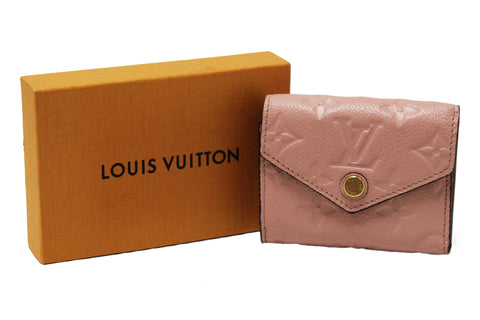Authentic Louis Vuitton Pink Monogram Empreinte Leather Zoe Wallet