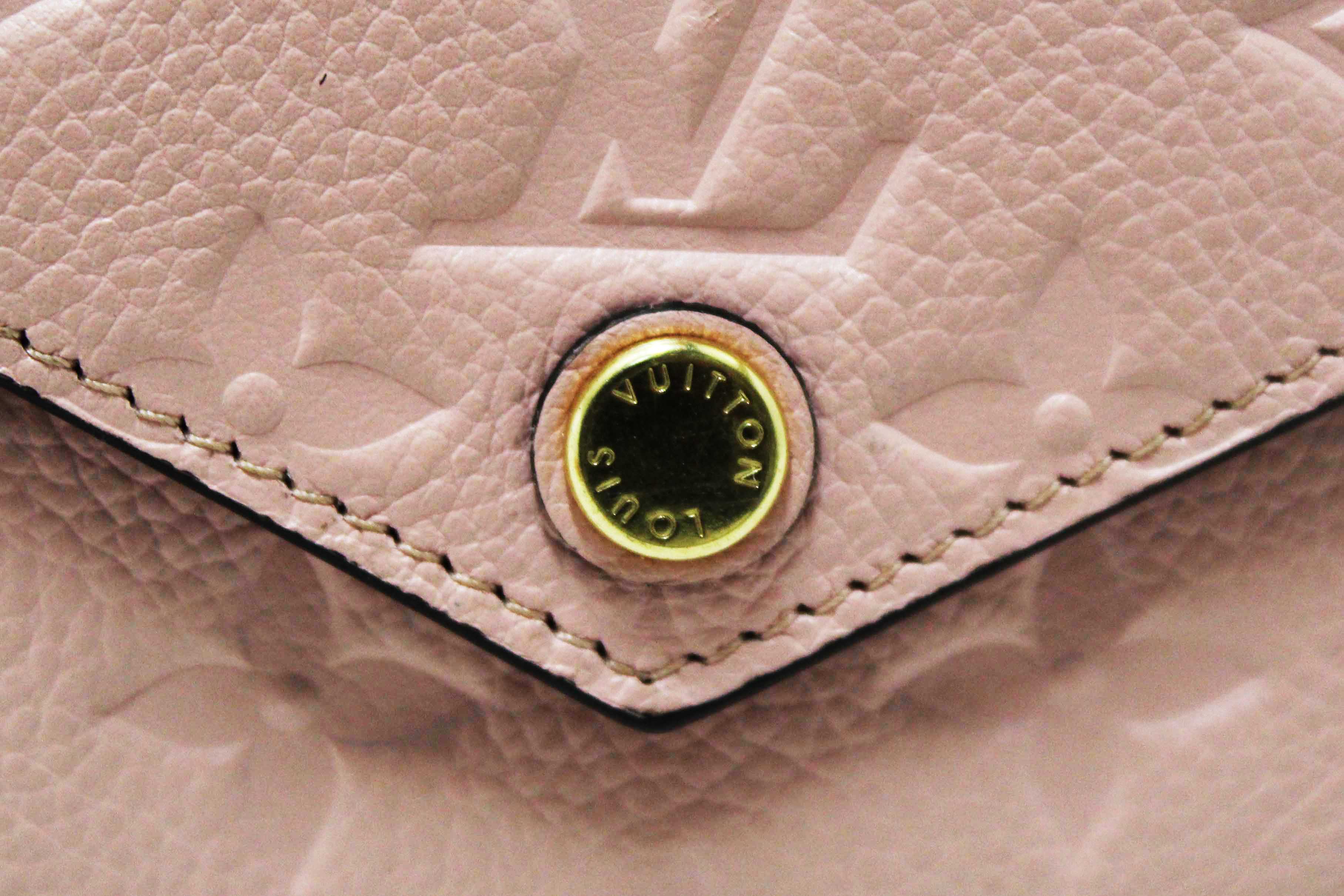 Authentic Louis Vuitton Pink Monogram Empreinte Leather Zoe Wallet