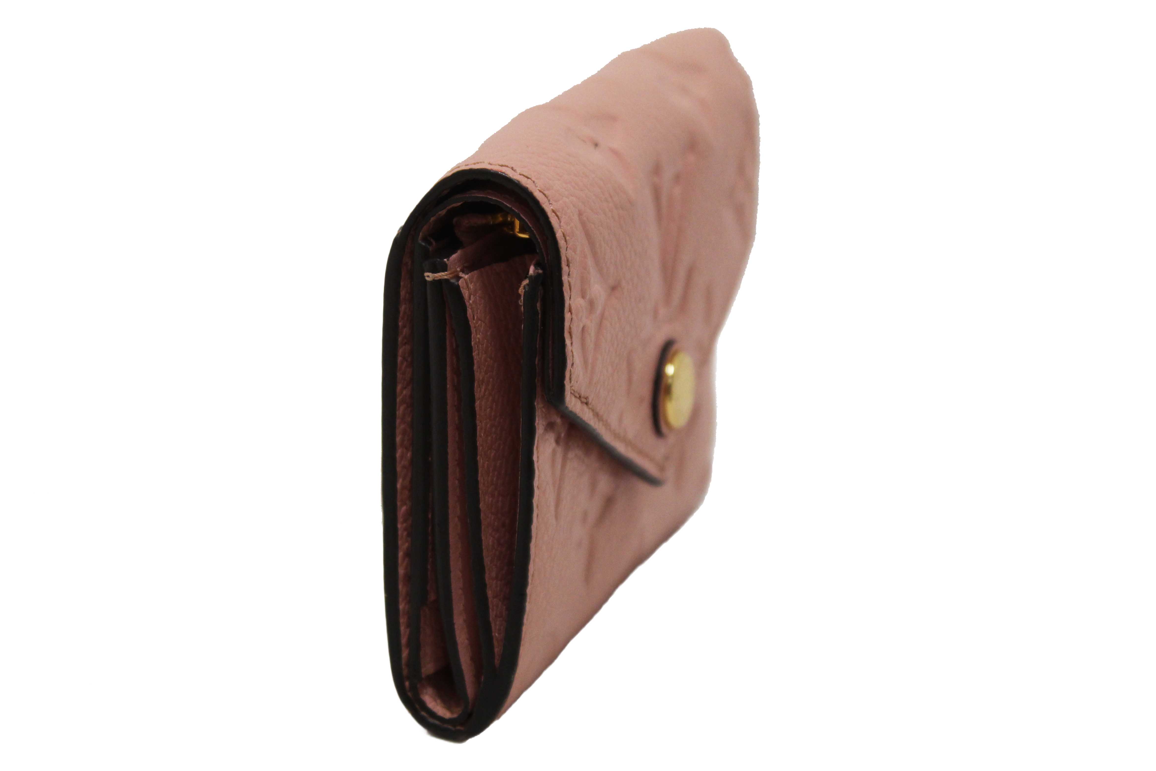 Authentic Louis Vuitton Pink Monogram Empreinte Leather Zoe Wallet
