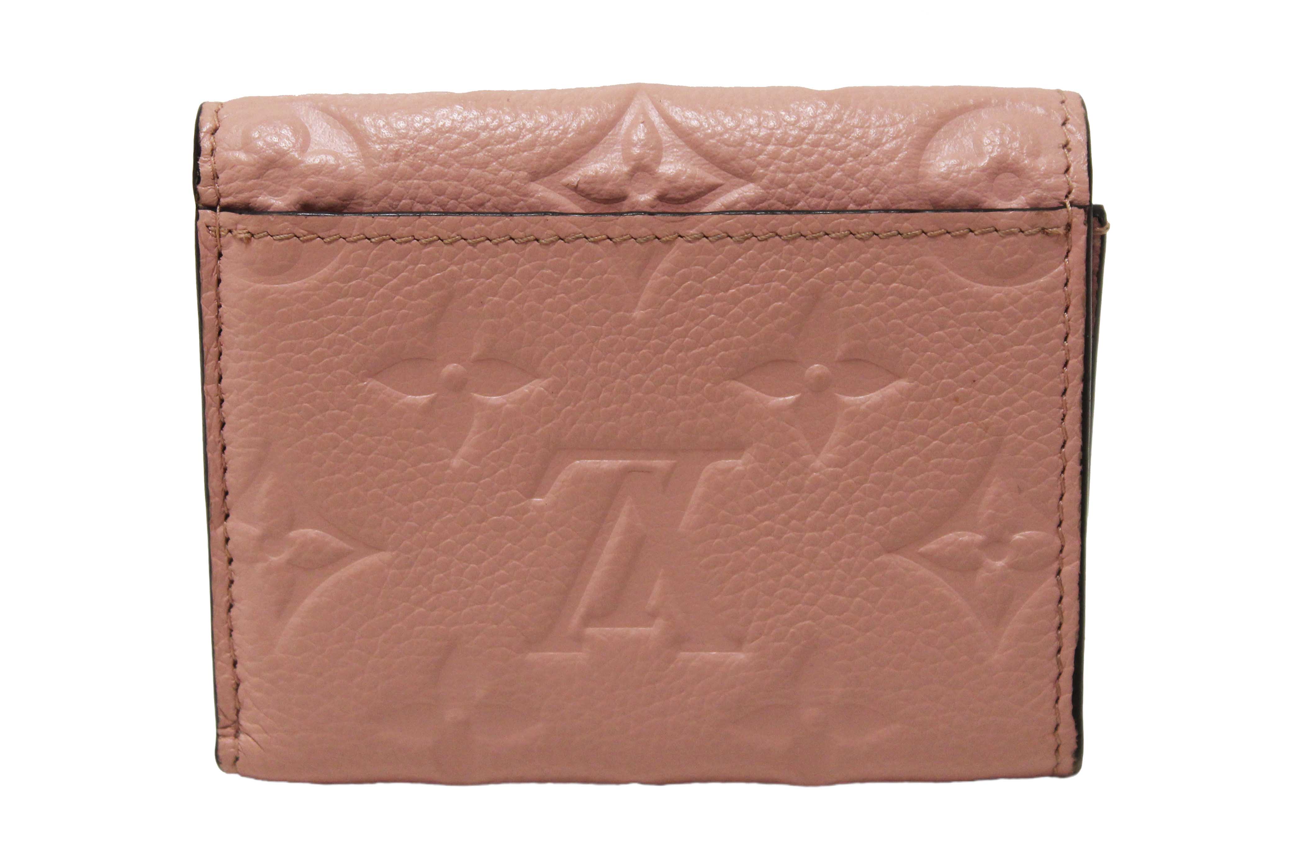 Authentic Louis Vuitton Pink Monogram Empreinte Leather Zoe Wallet