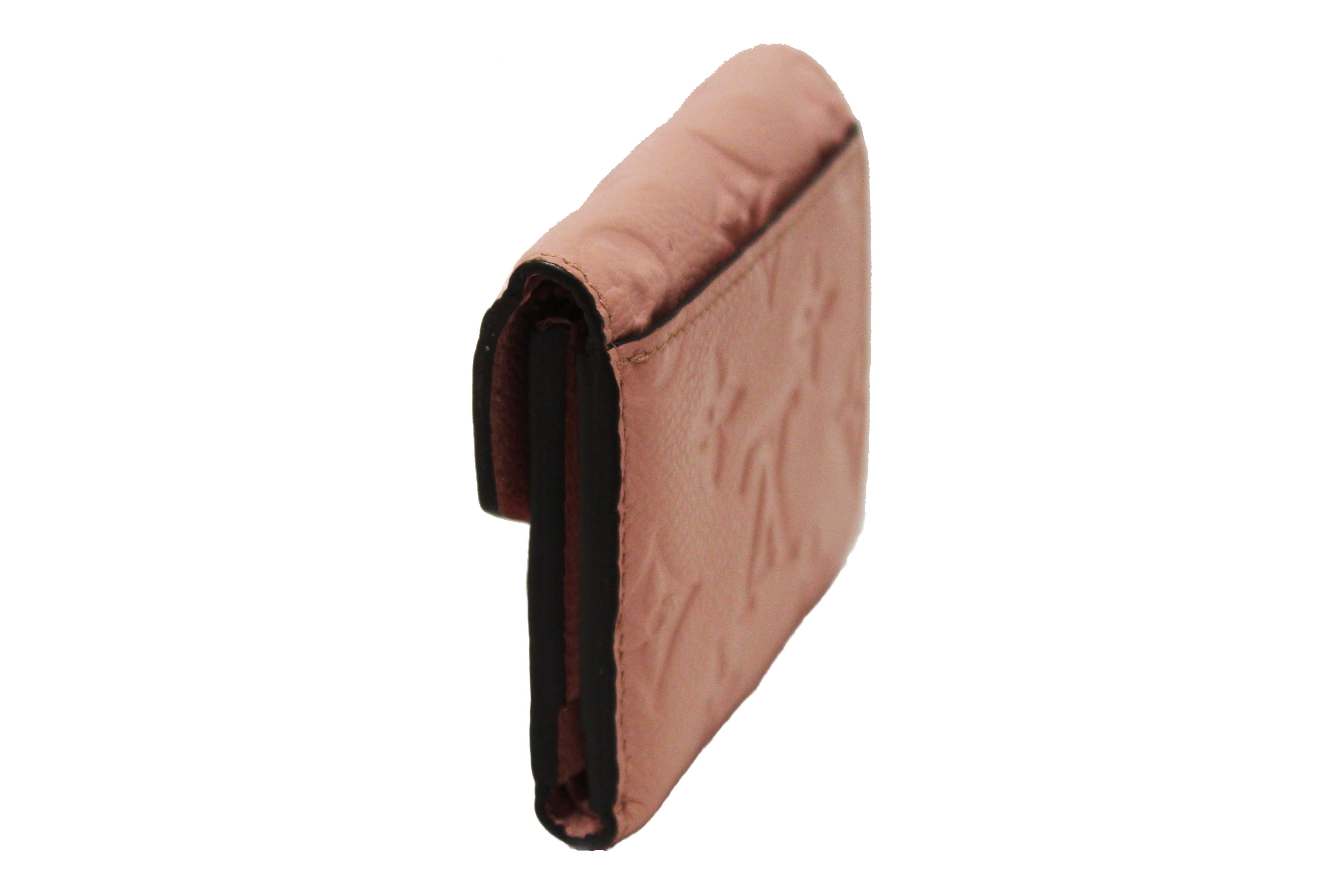Authentic Louis Vuitton Pink Monogram Empreinte Leather Zoe Wallet