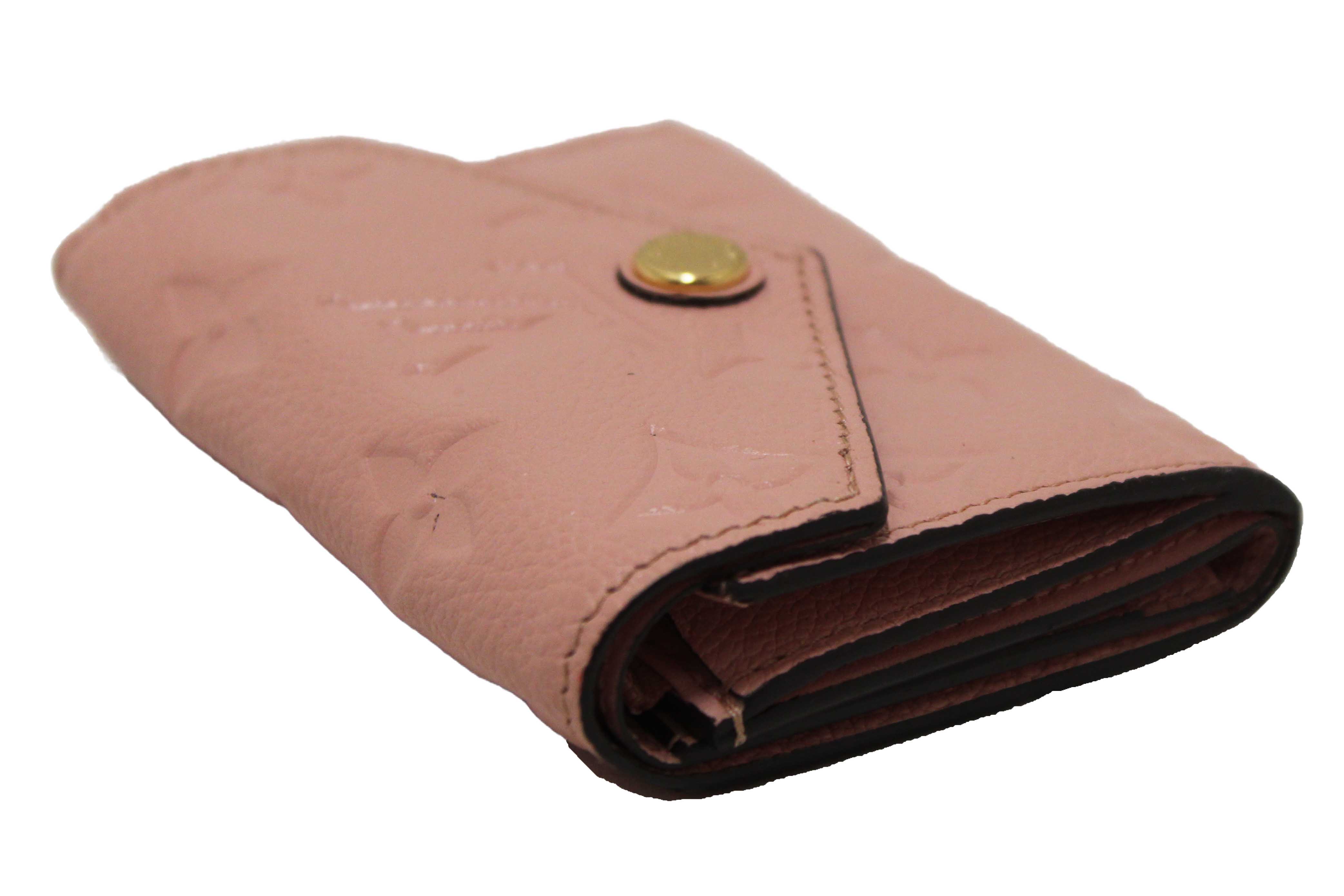 Authentic Louis Vuitton Pink Monogram Empreinte Leather Zoe Wallet