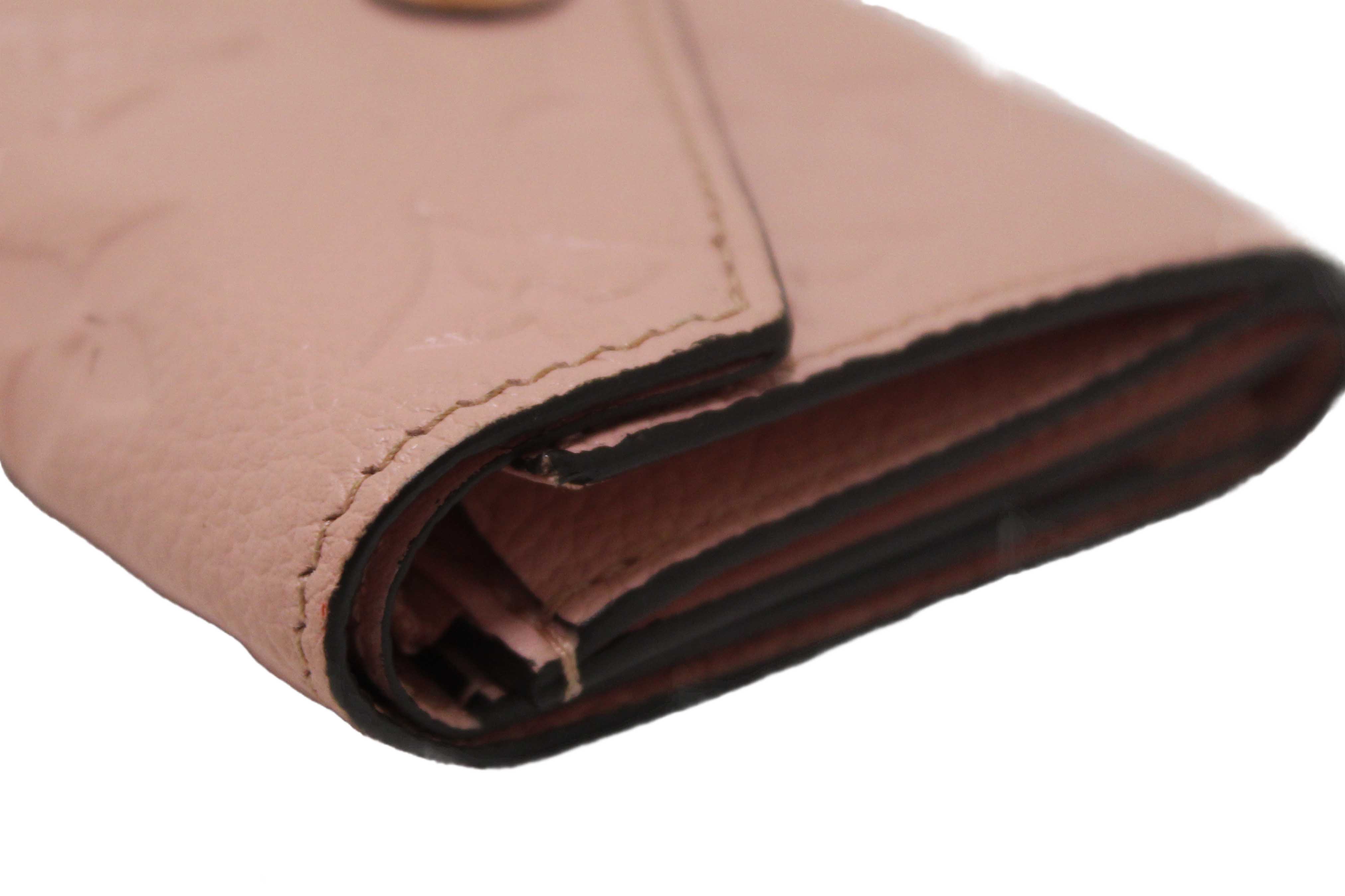 Authentic Louis Vuitton Pink Monogram Empreinte Leather Zoe Wallet