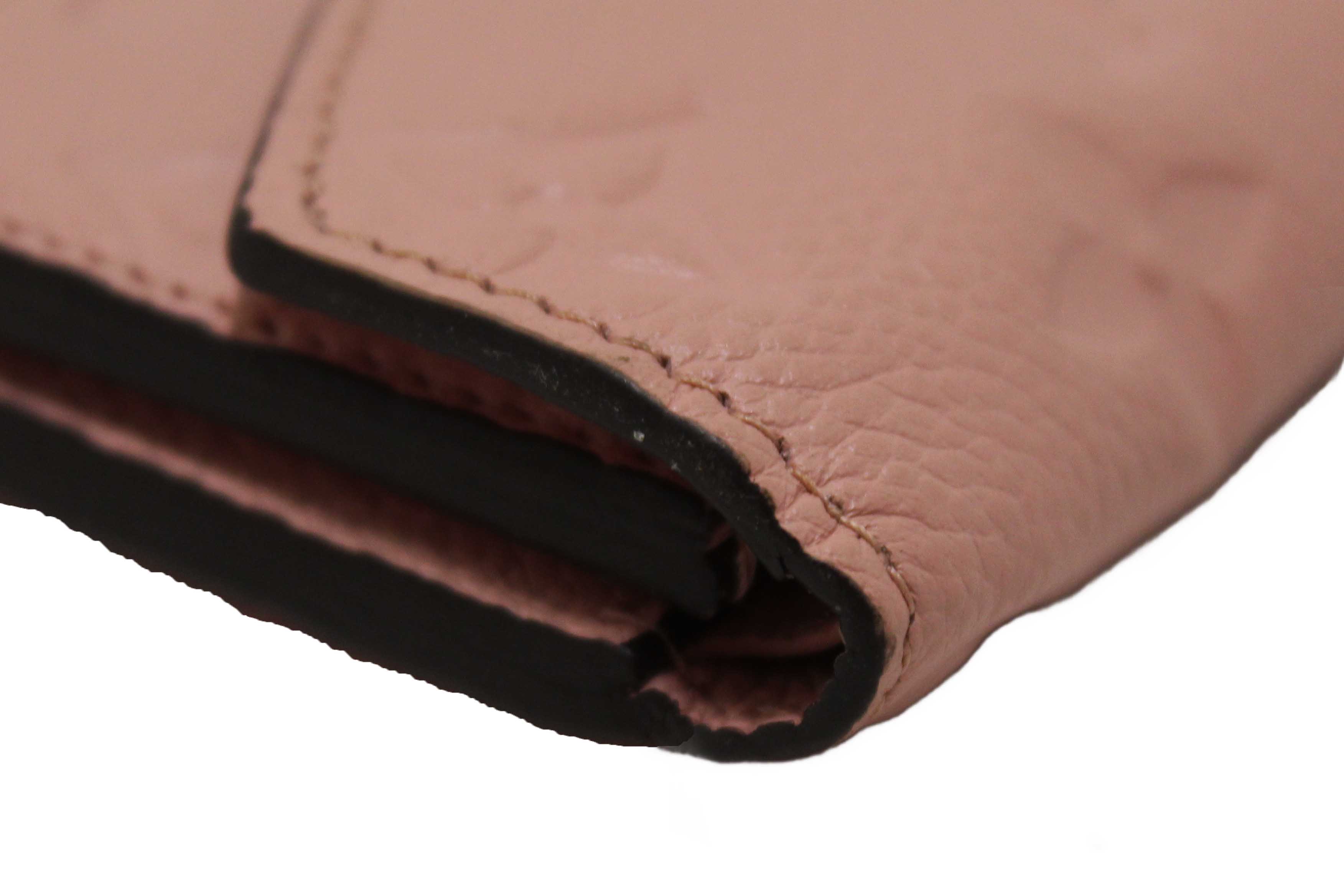 Authentic Louis Vuitton Pink Monogram Empreinte Leather Zoe Wallet