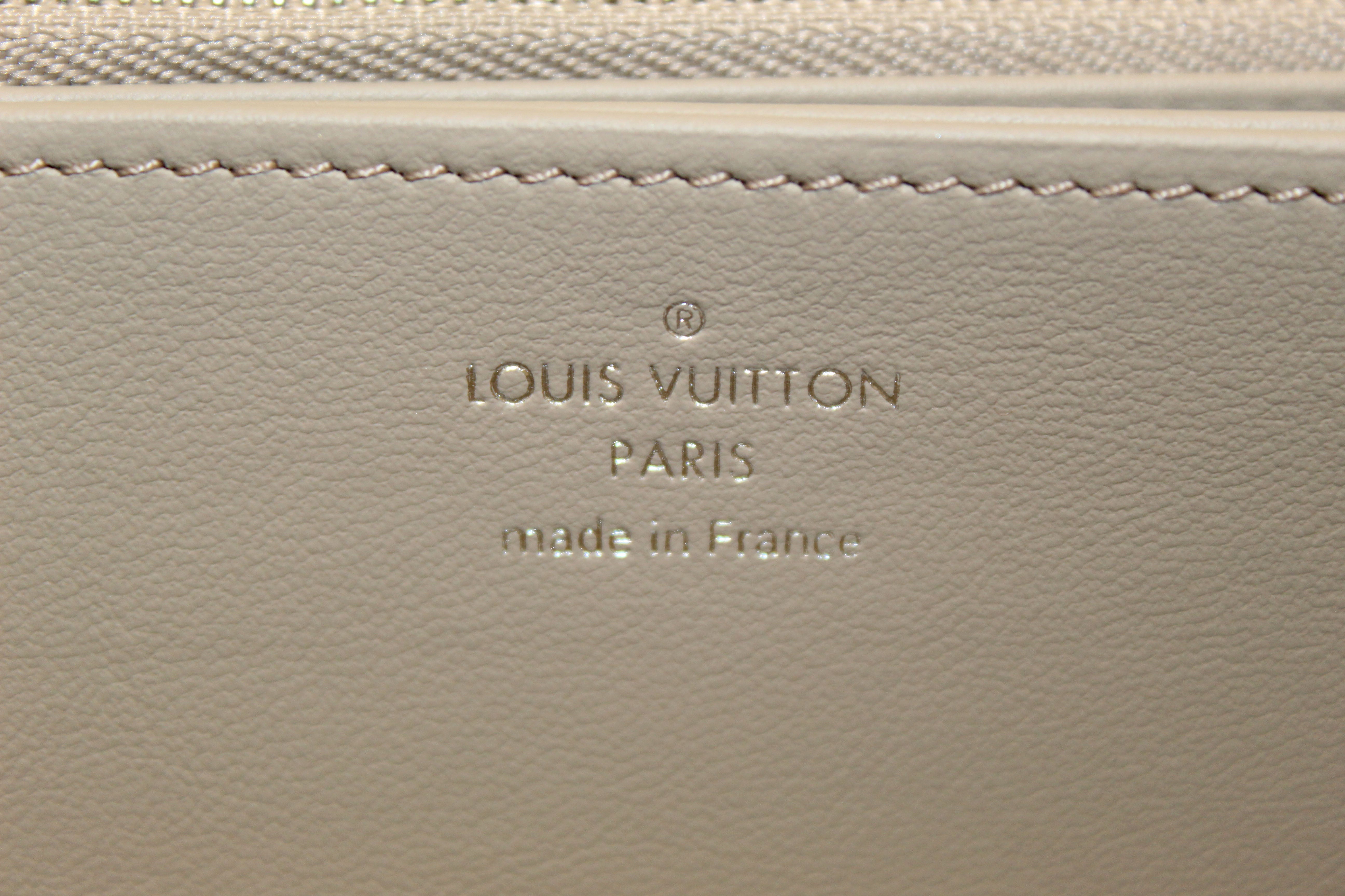 Authentic Louis Vuitton Galet Mahina Leather Zippy Wallet