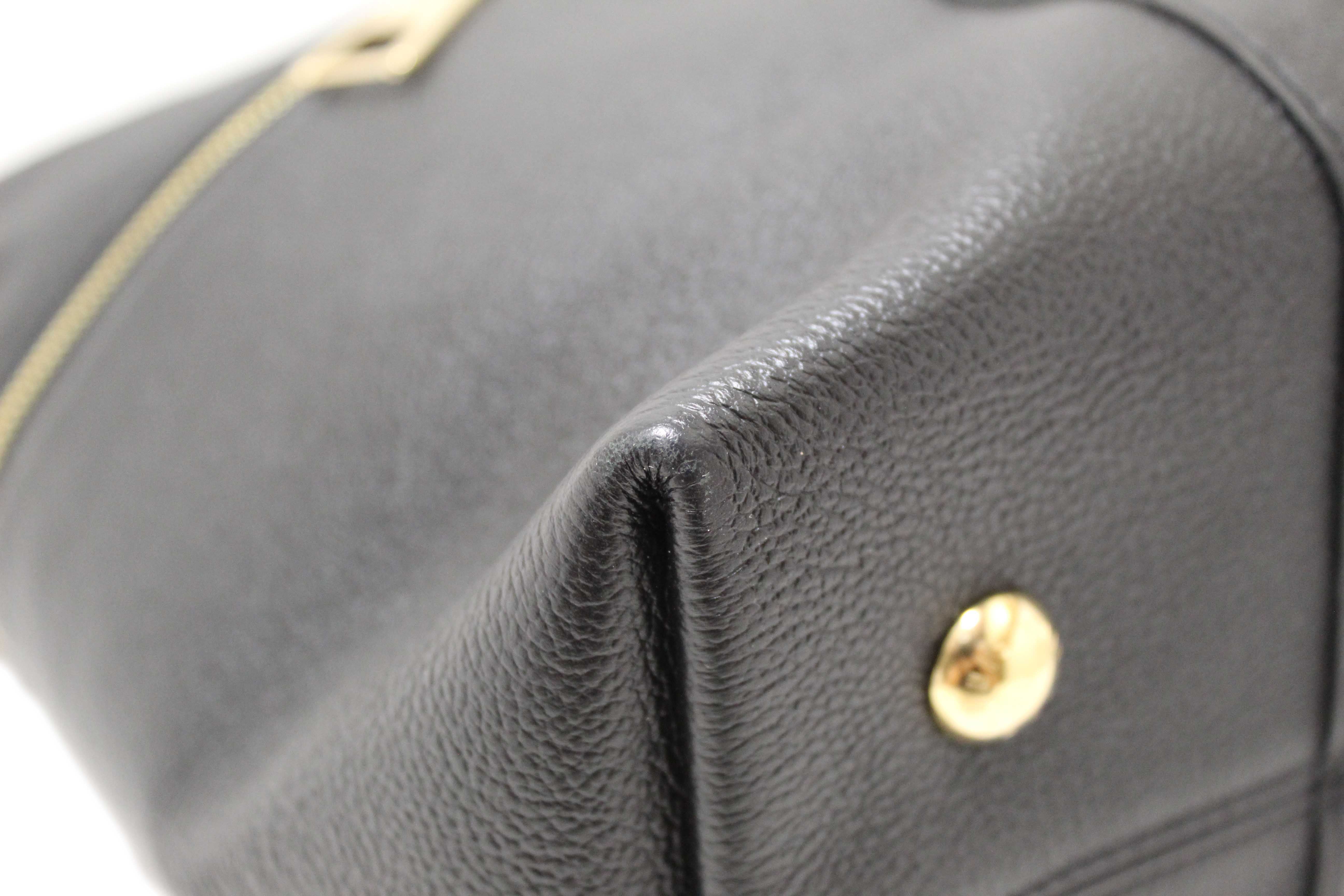 Authentic Louis Vuitton Black Monogram Empreinte Leather Melie Hobo Bag