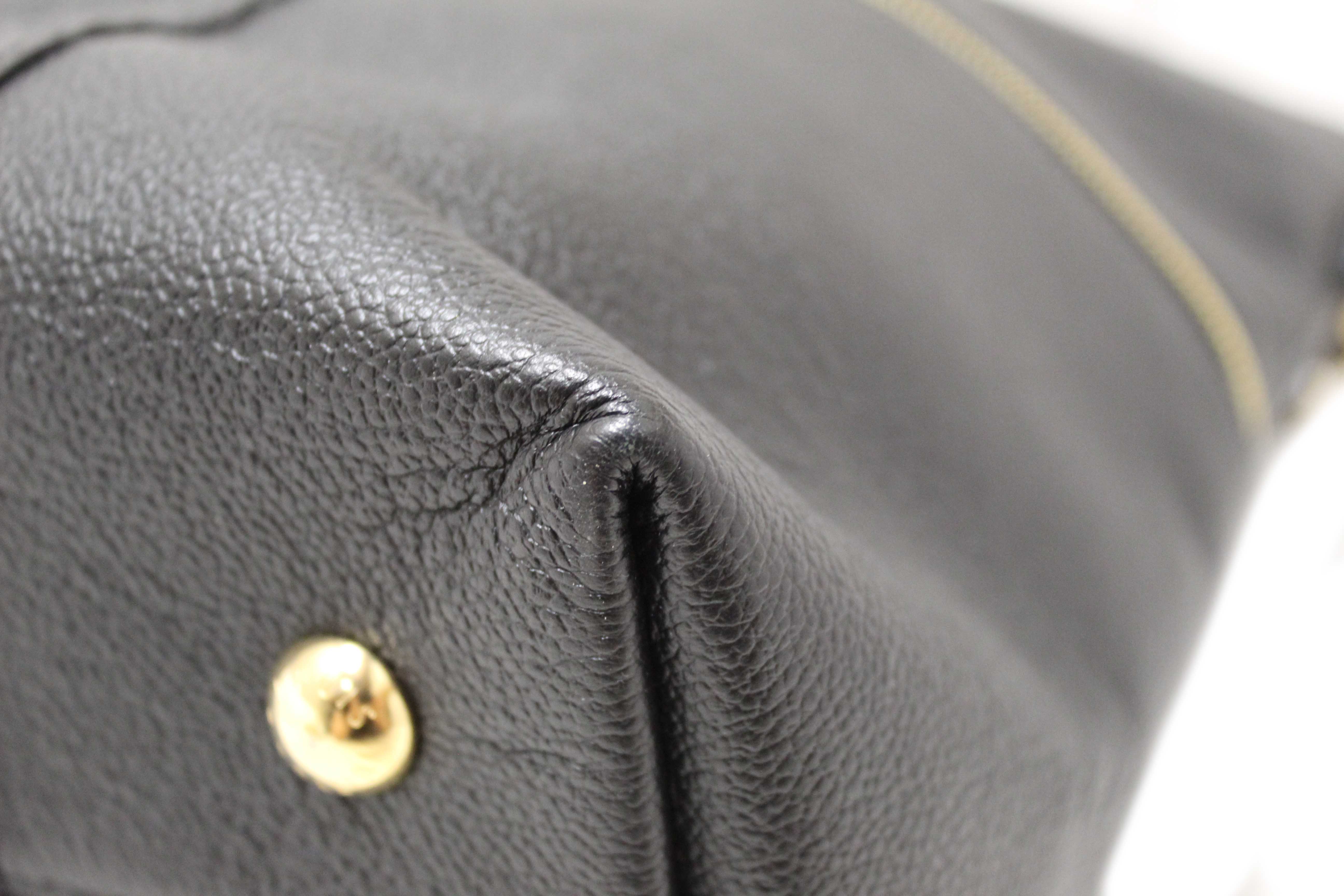 Authentic Louis Vuitton Black Monogram Empreinte Leather Melie Hobo Bag