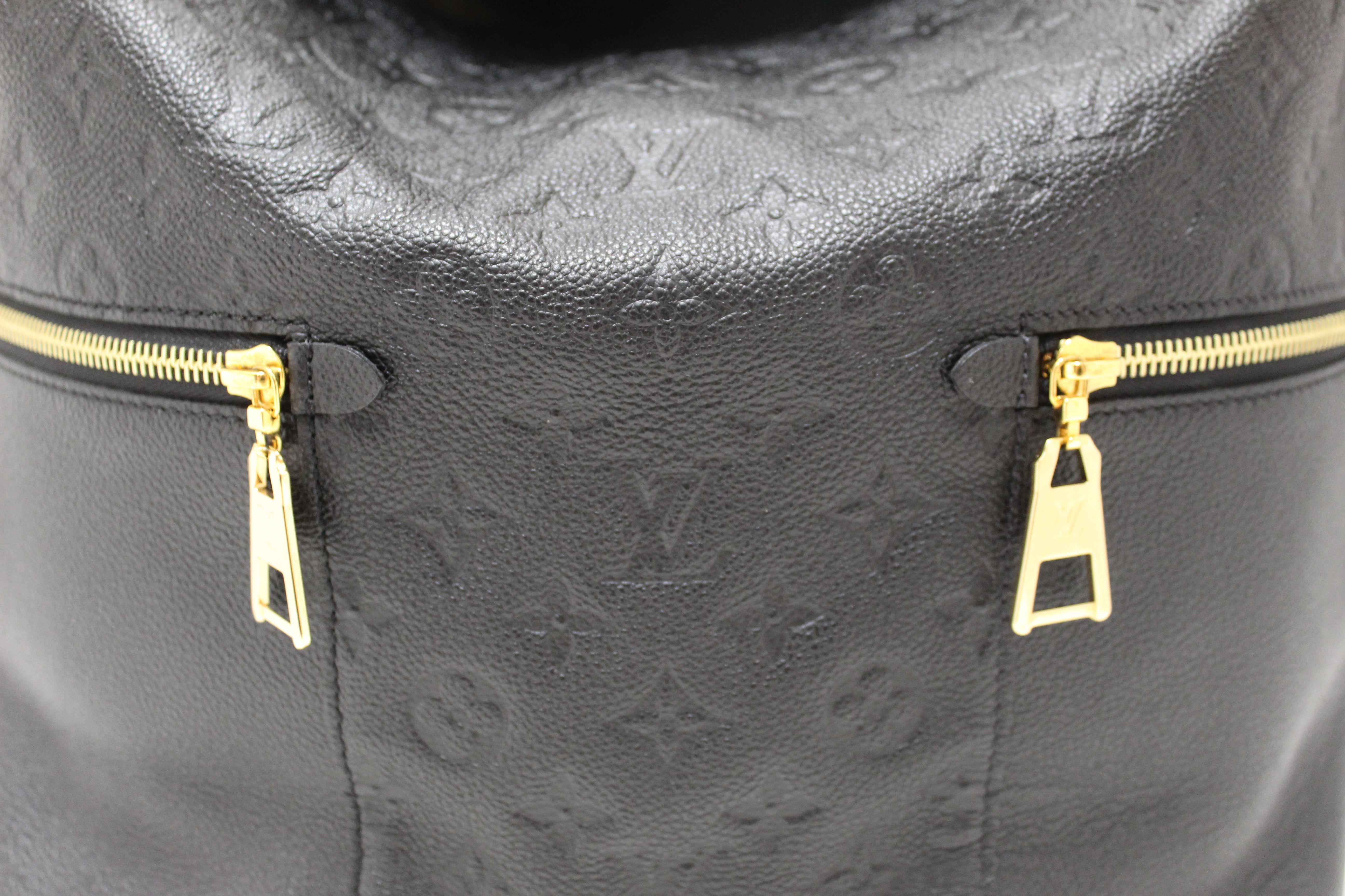 Authentic Louis Vuitton Black Monogram Empreinte Leather Melie Hobo Bag