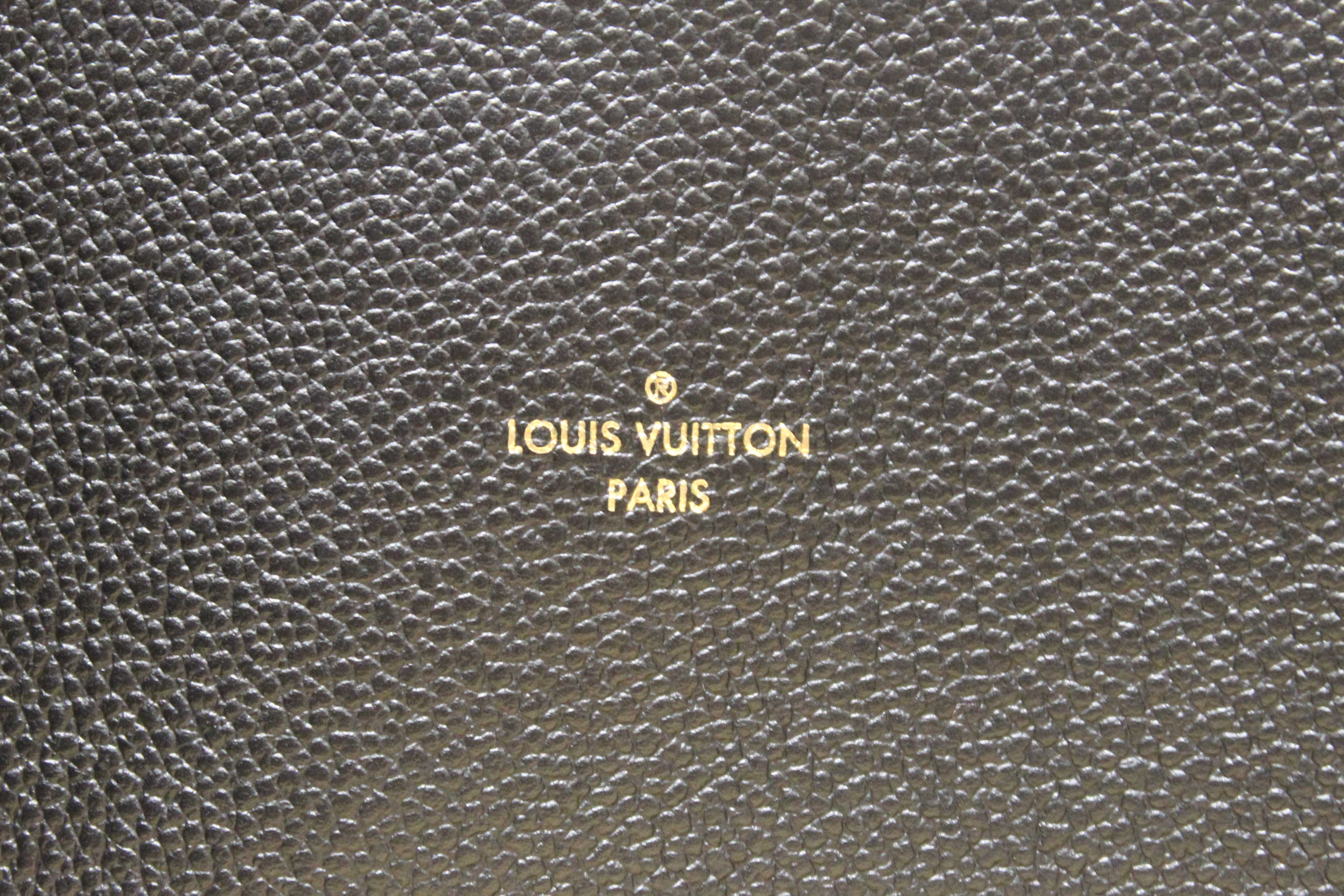 Authentic Louis Vuitton Black Monogram Empreinte Leather Melie Hobo Bag