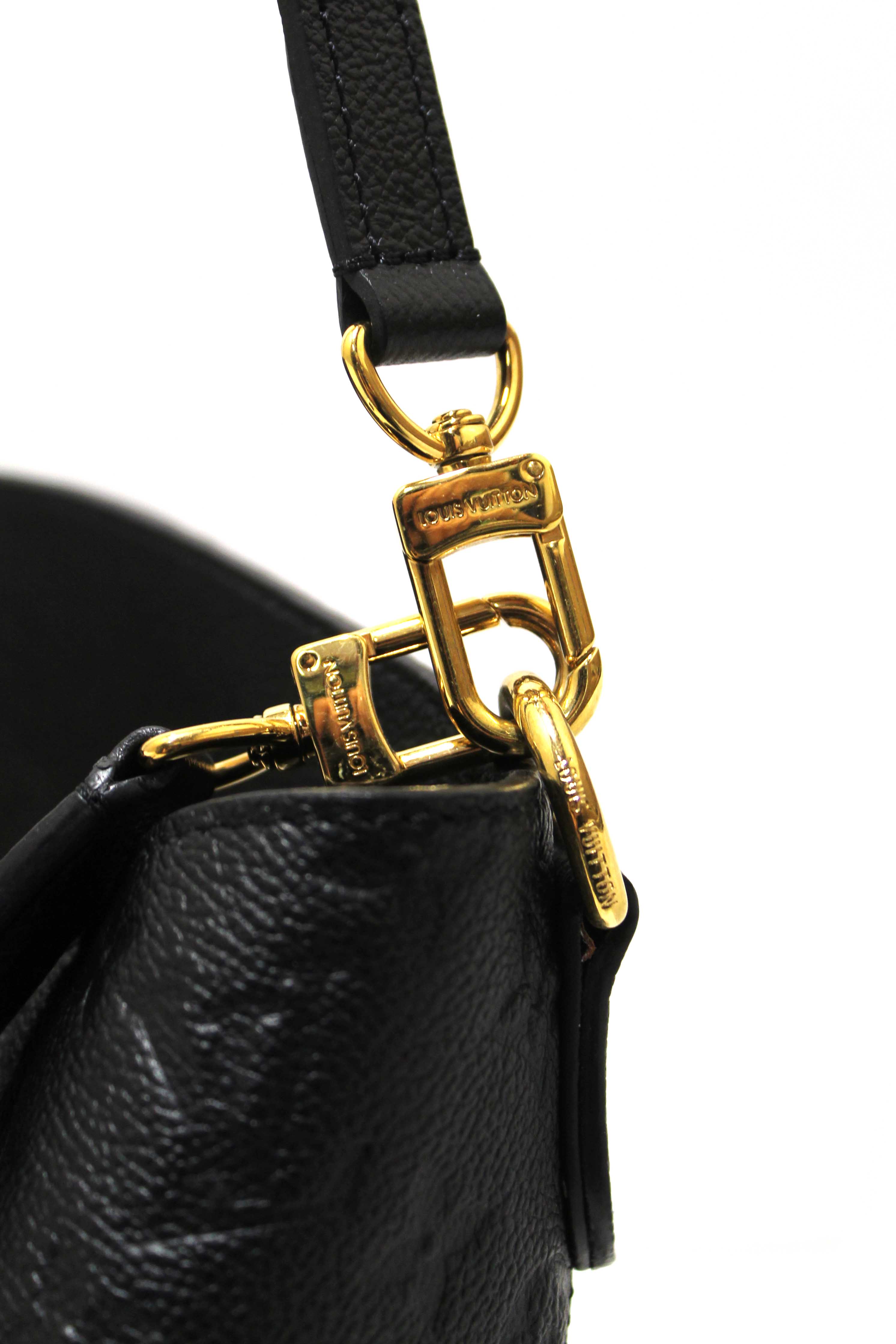 Authentic Louis Vuitton Black Monogram Empreinte Leather Melie Hobo Bag