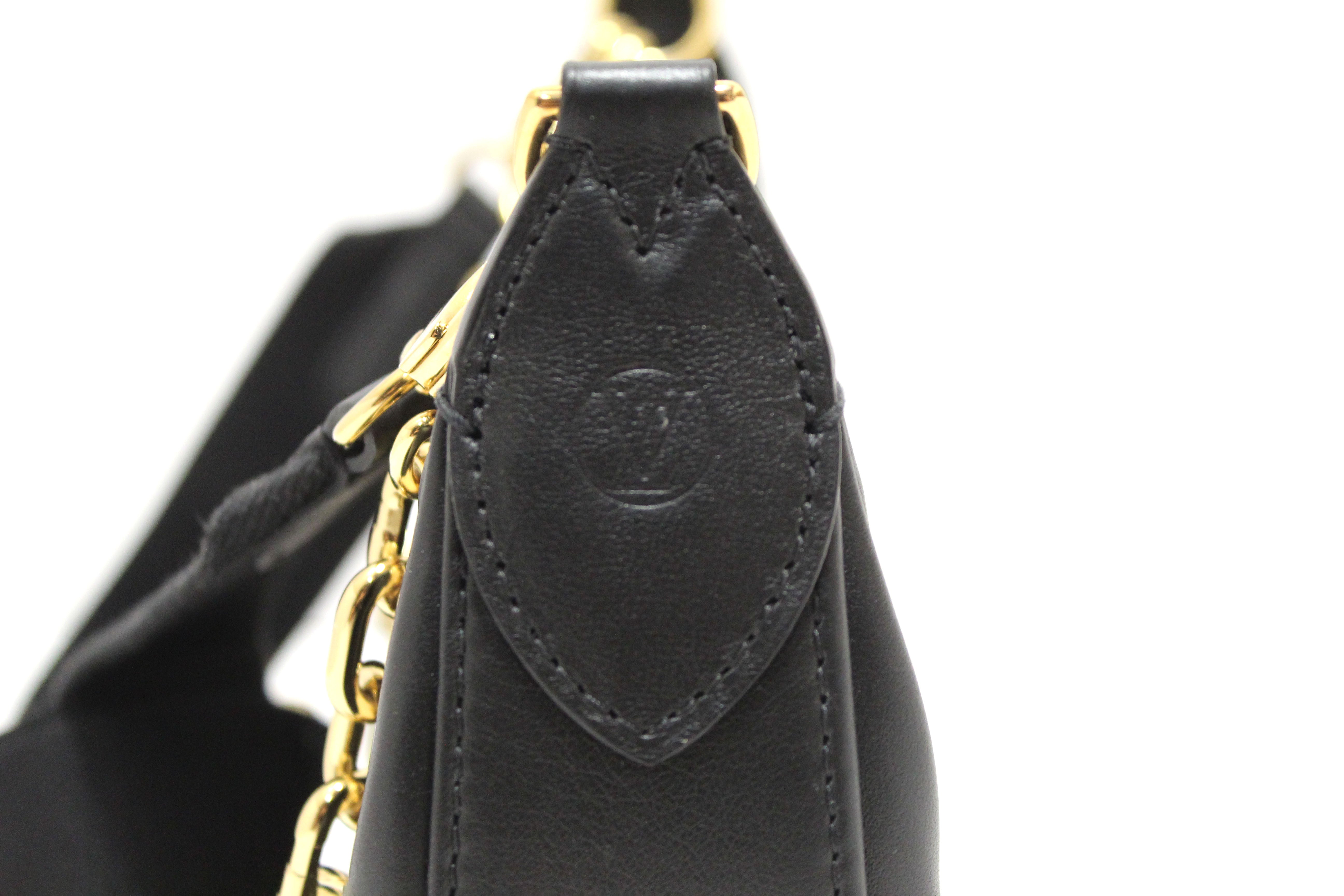 Authentic Louis Vuitton Black Bubblegram Leather Over the Moon Bag