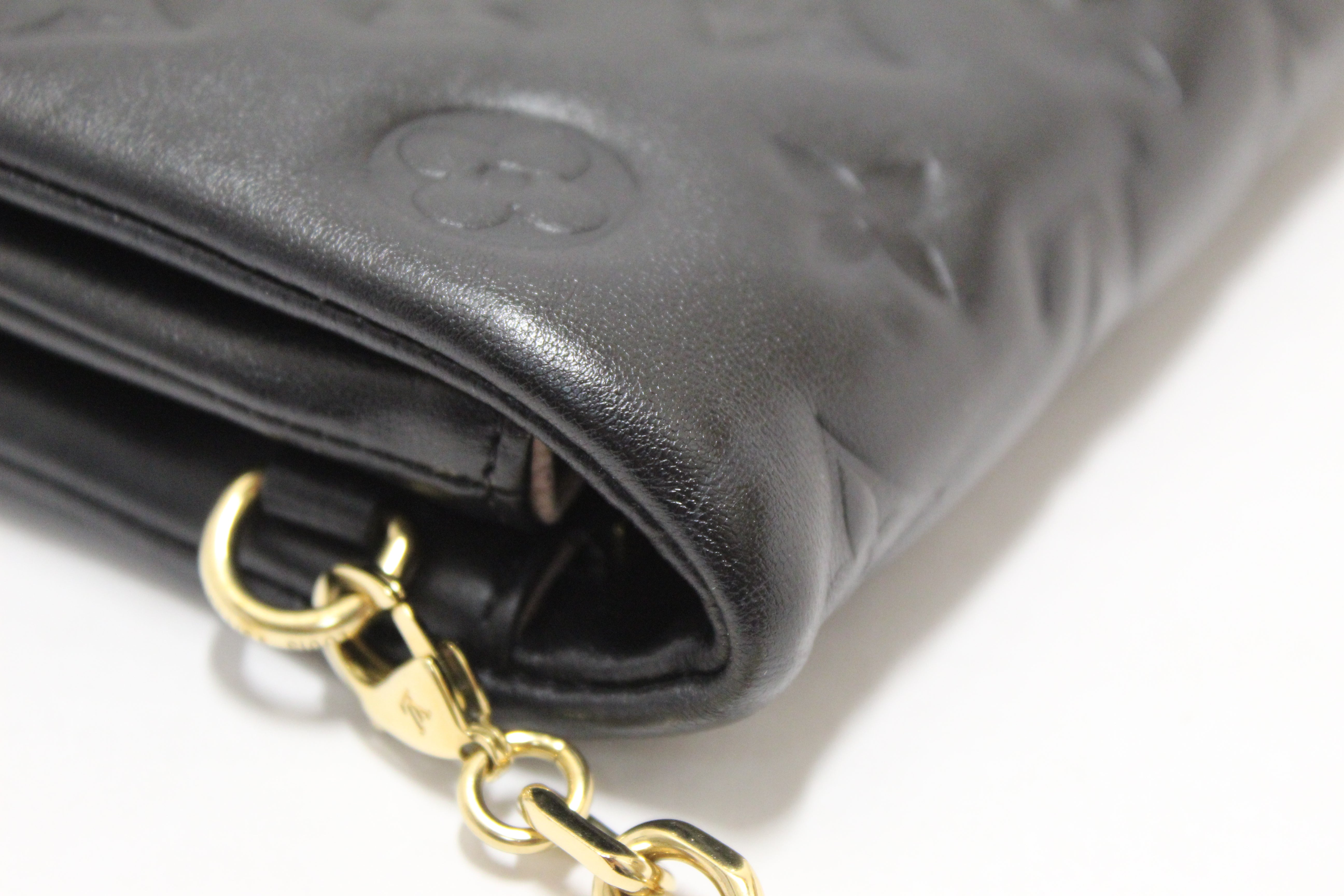 Authentic Louis Vuitton Black Monogram-Embossed Lambskin Pochette Coussin Bag