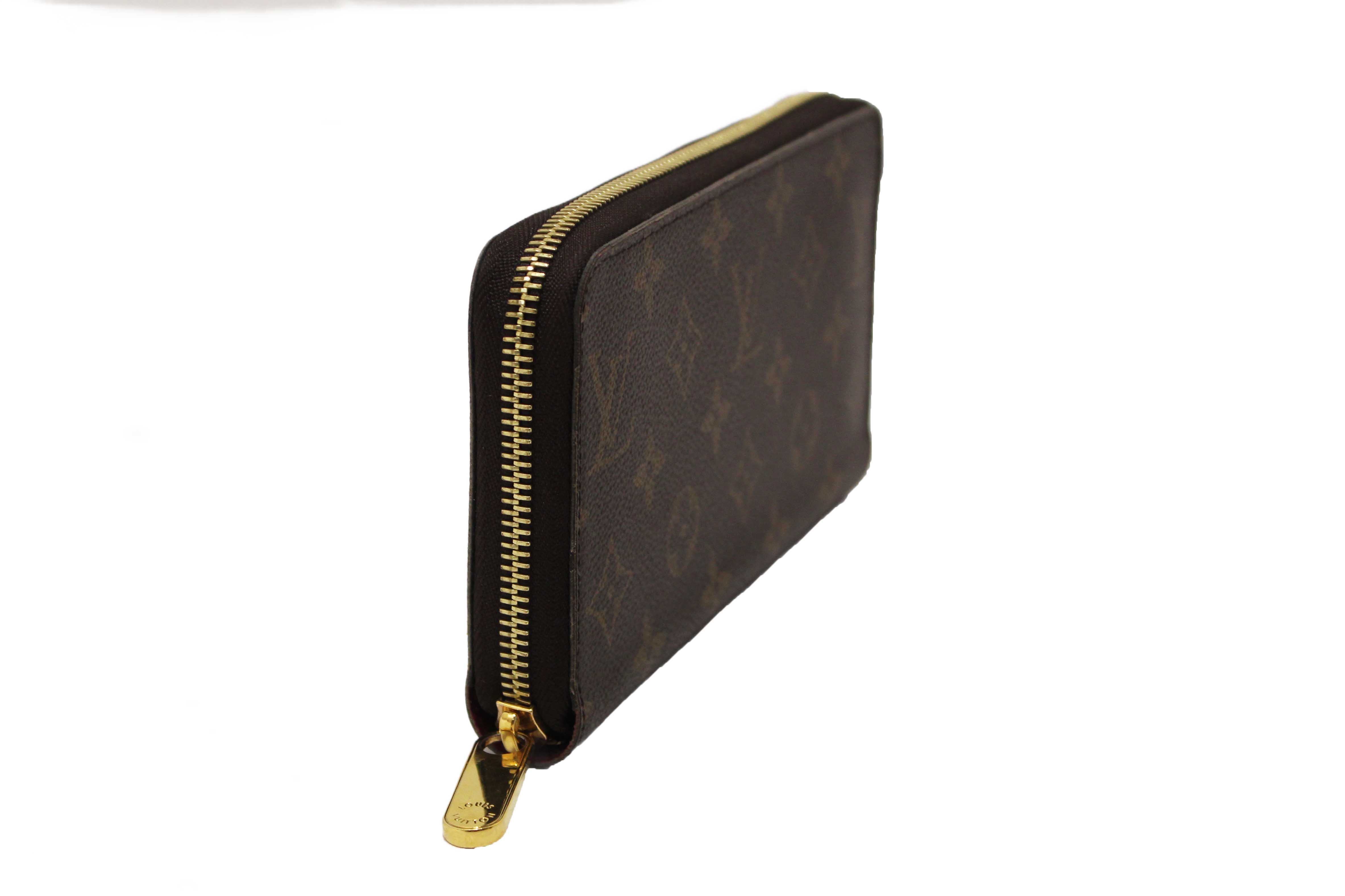 Authentic Louis Vuitton Classic Monogram Canvas Zippy Wallet