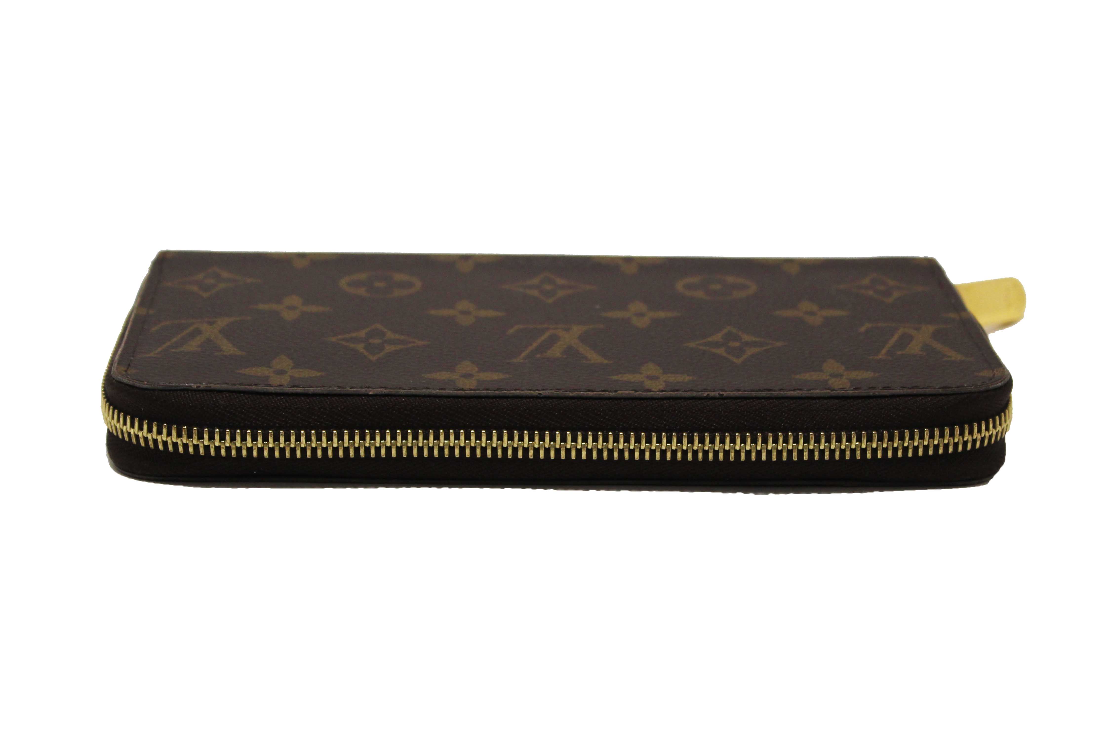 Authentic Louis Vuitton Classic Monogram Canvas Zippy Wallet
