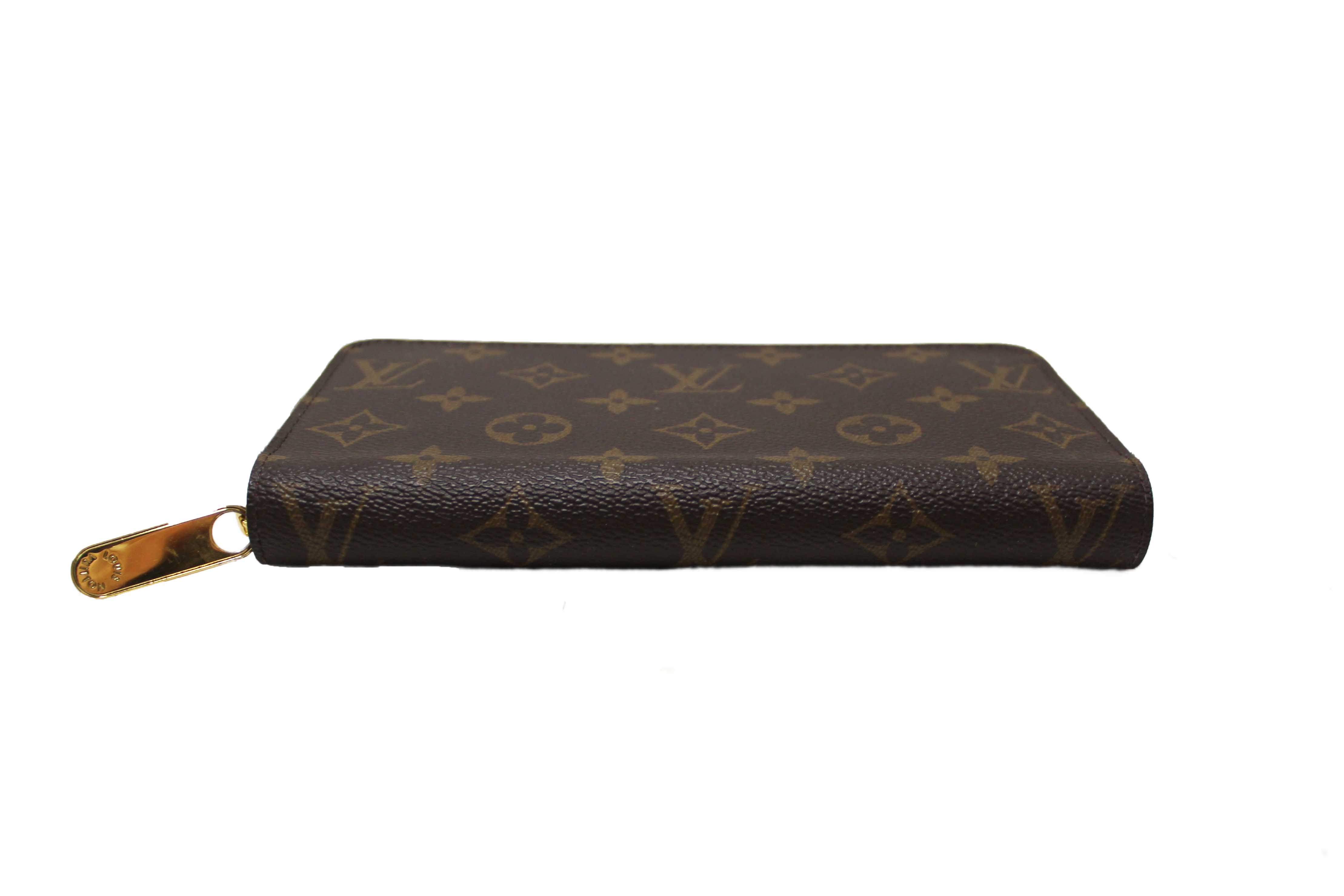 Authentic Louis Vuitton Classic Monogram Canvas Zippy Wallet