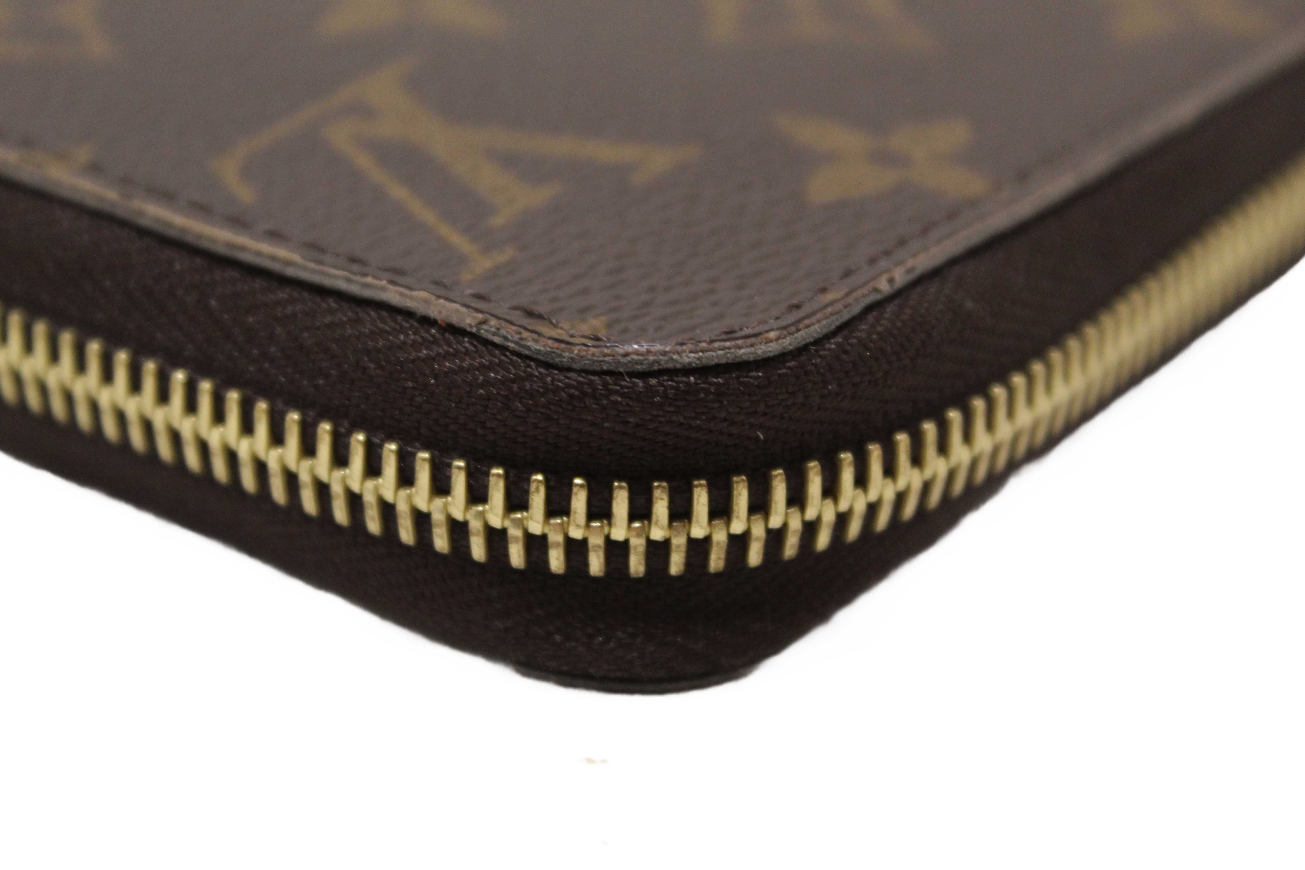 Authentic Louis Vuitton Classic Monogram Canvas Zippy Wallet