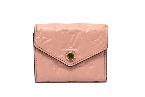 Authentic Louis Vuitton Pink Monogram Empreinte Leather Zoé Wallet
