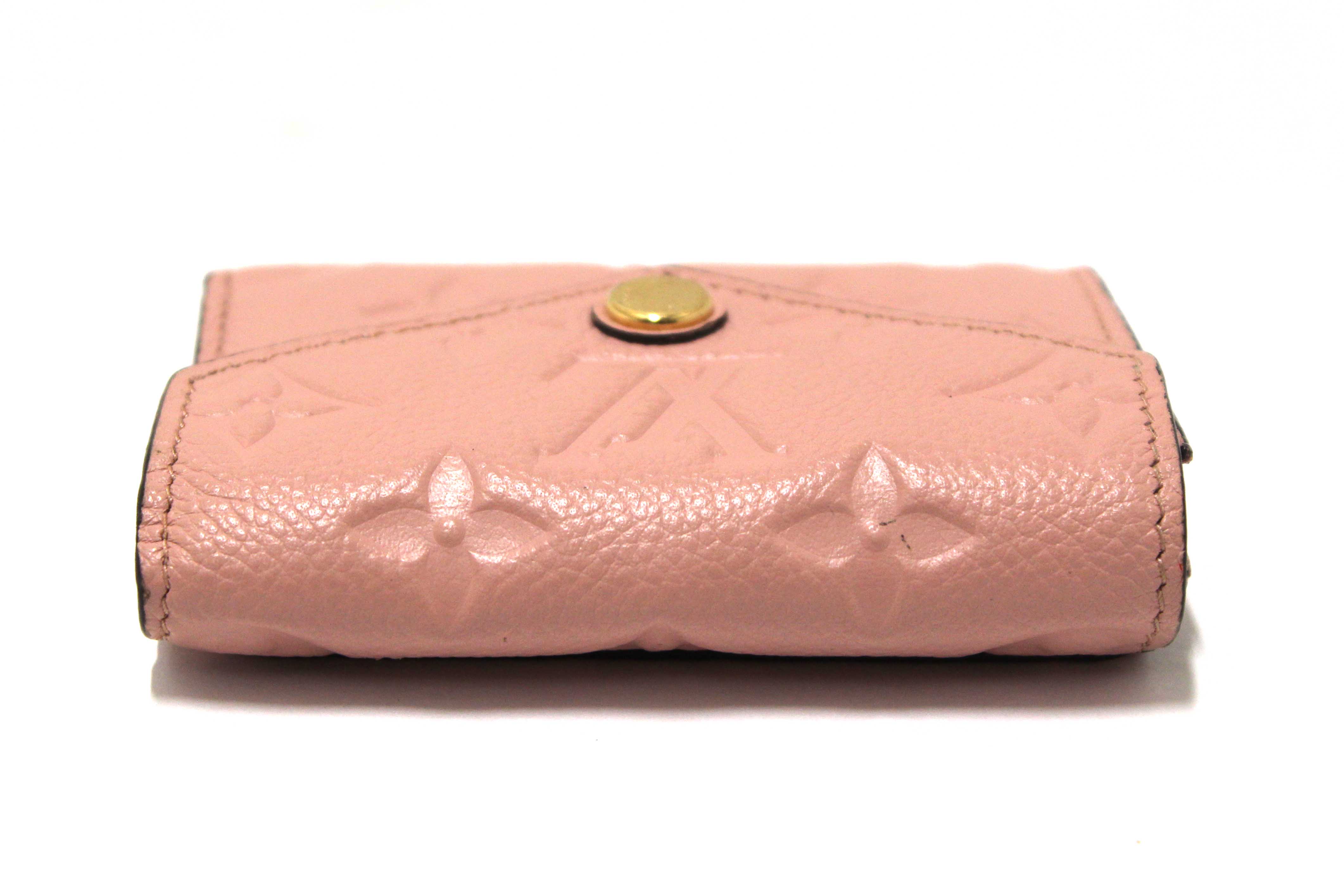 Authentic Louis Vuitton Pink Monogram Empreinte Leather Zoé Wallet