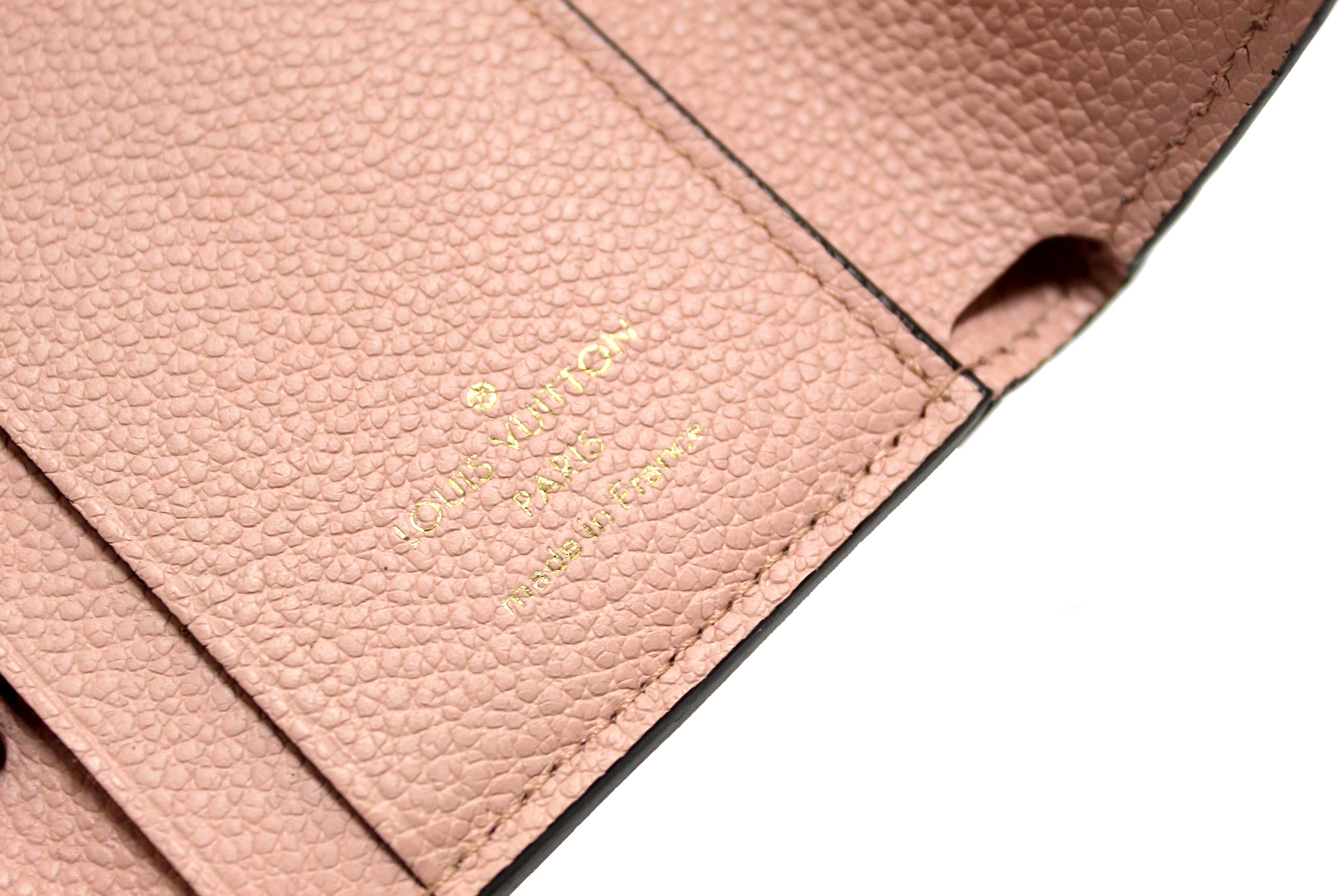 Authentic Louis Vuitton Pink Monogram Empreinte Leather Zoé Wallet