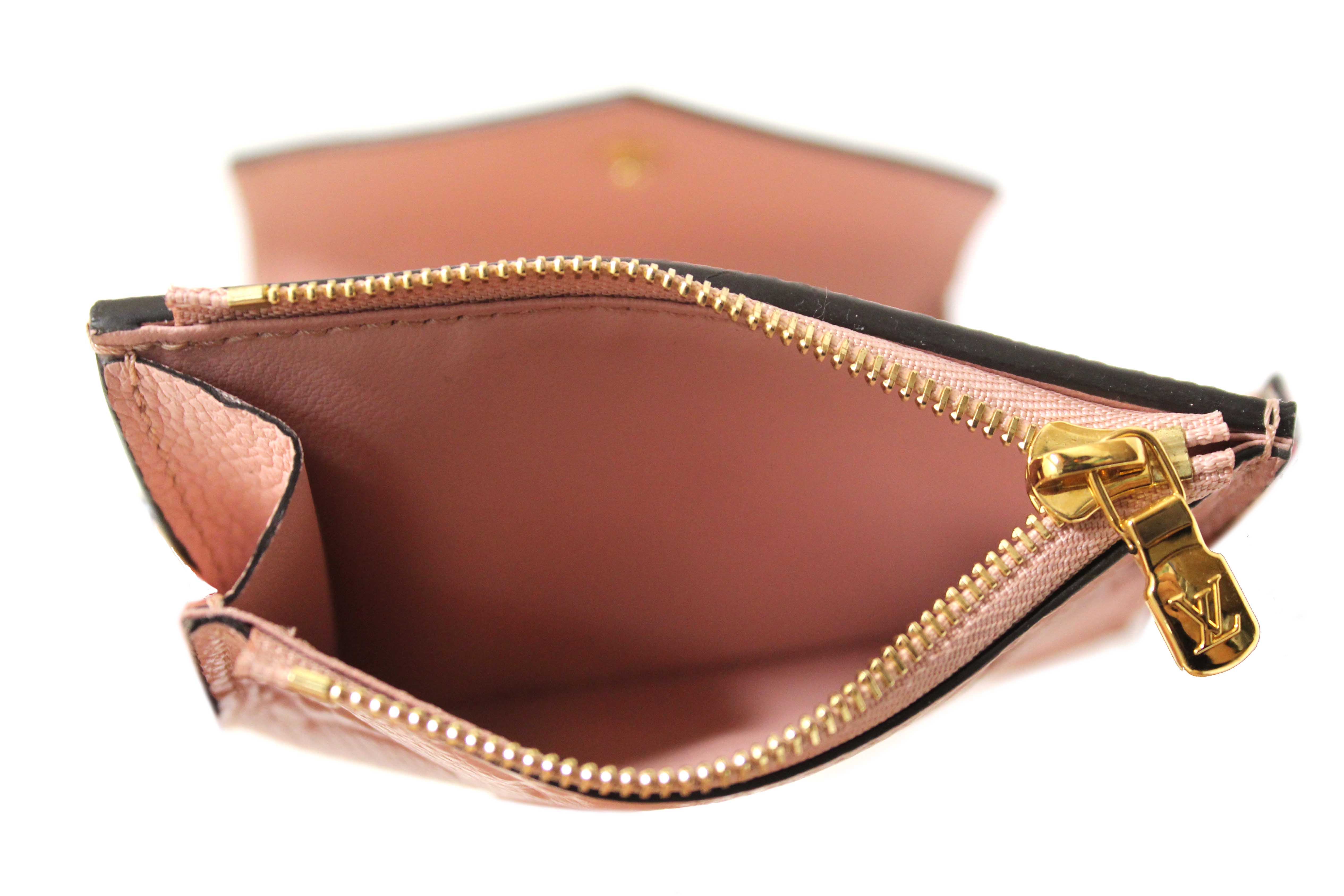 Authentic Louis Vuitton Pink Monogram Empreinte Leather Zoé Wallet