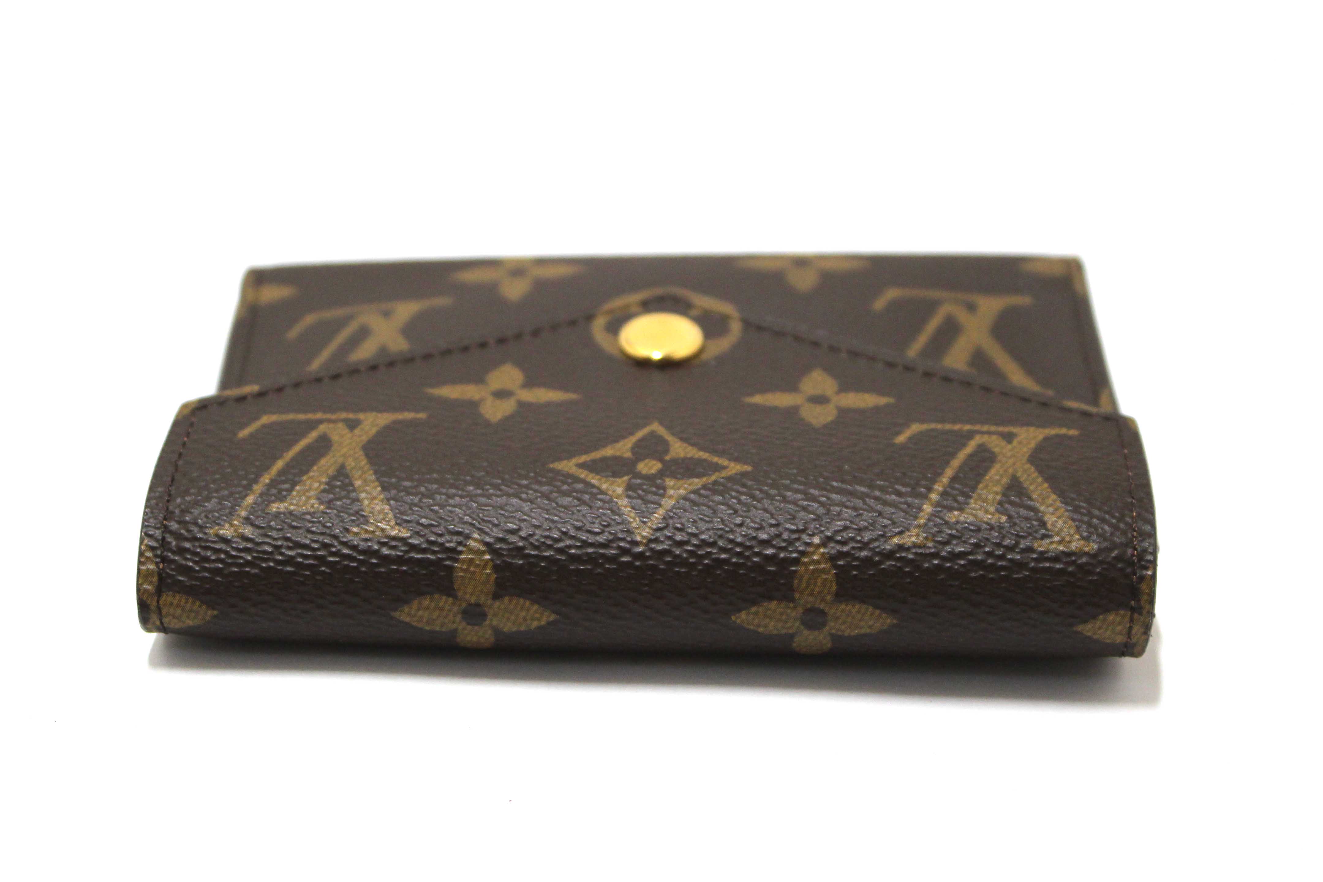 Authentic Louis Vuitton Classic Monogram Victorine Wallet