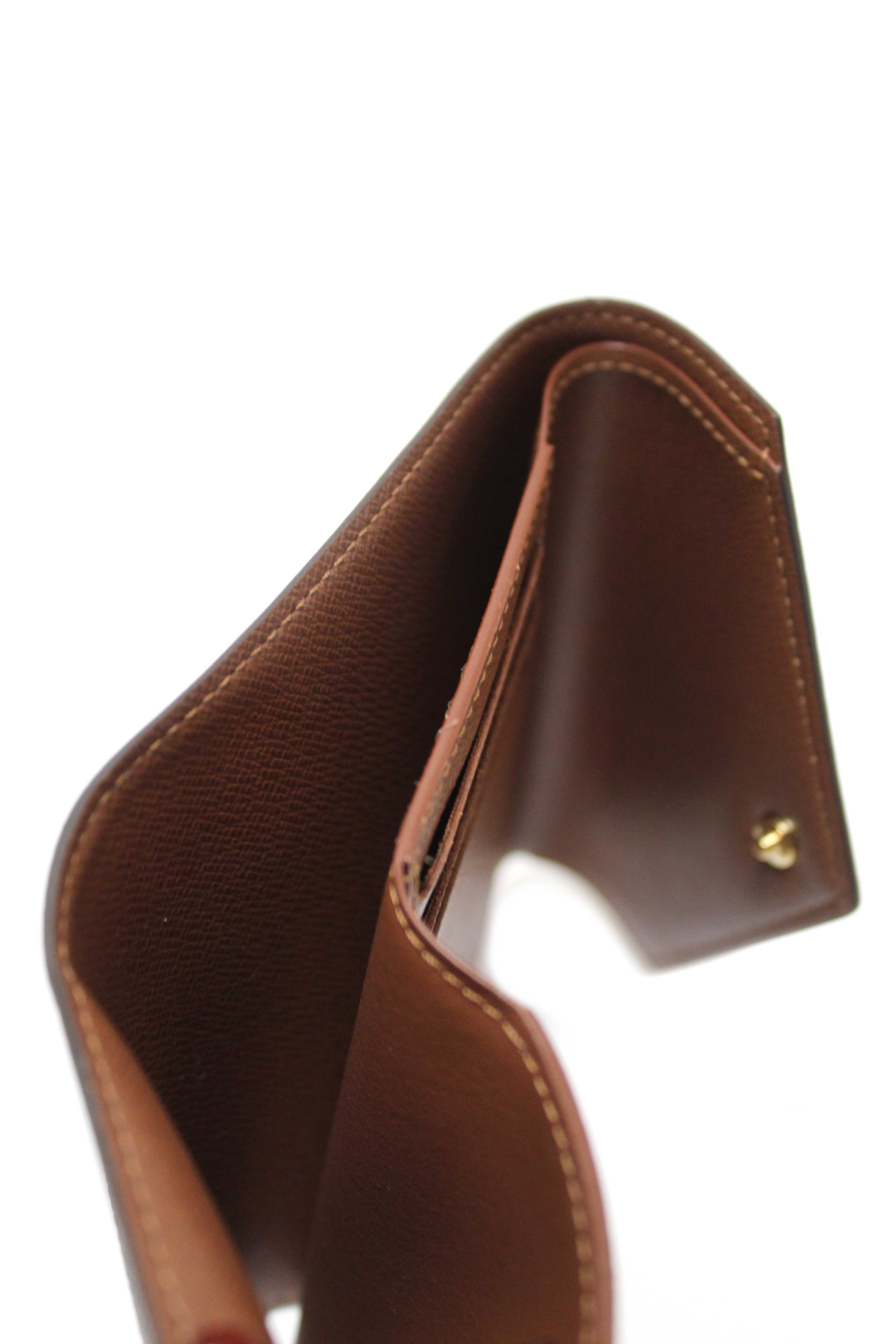 Authentic Louis Vuitton Classic Monogram Victorine Wallet