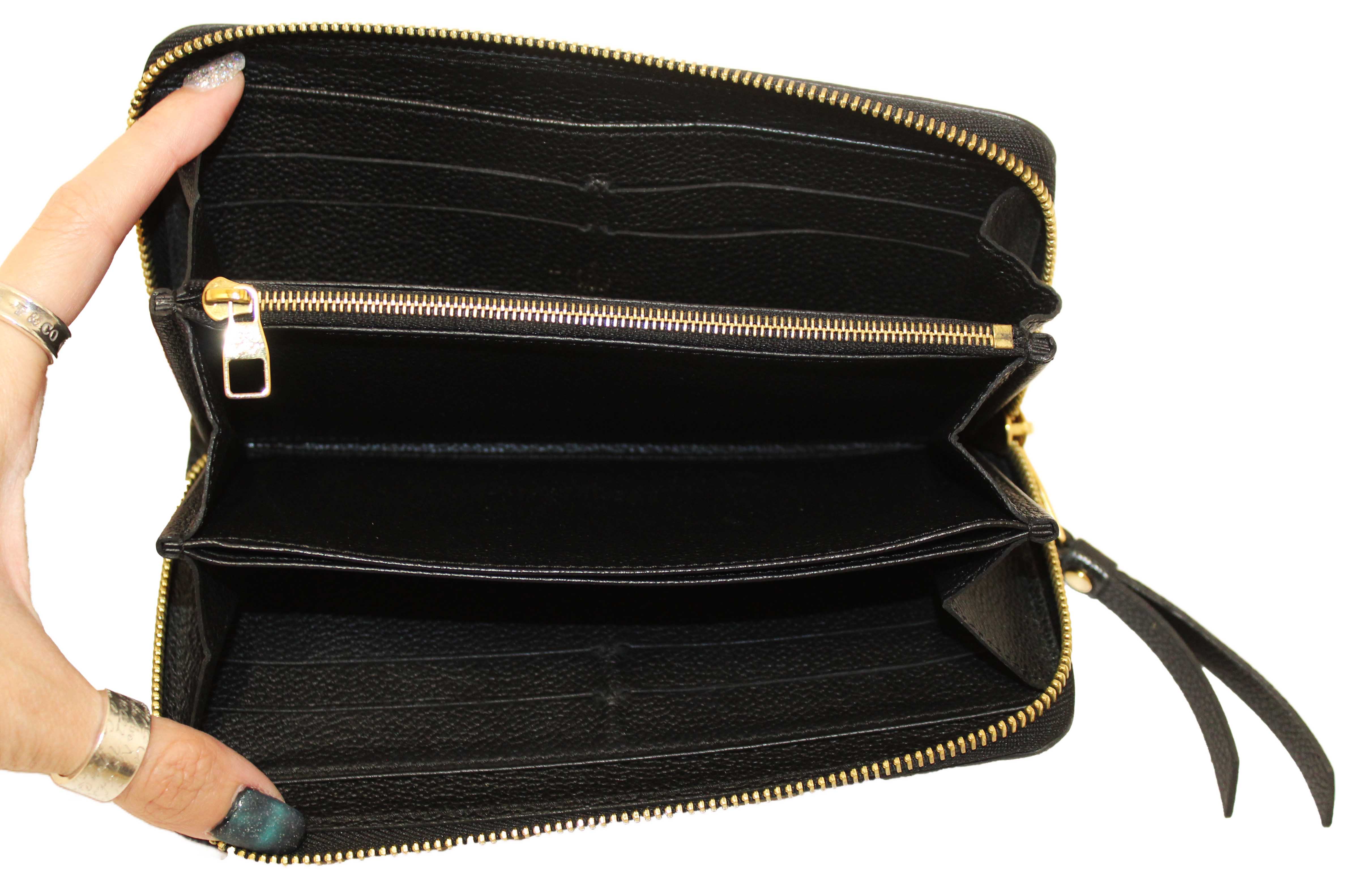 Authentic Louis Vuitton Black Monogram Empreinte Leather Zippy Wallet