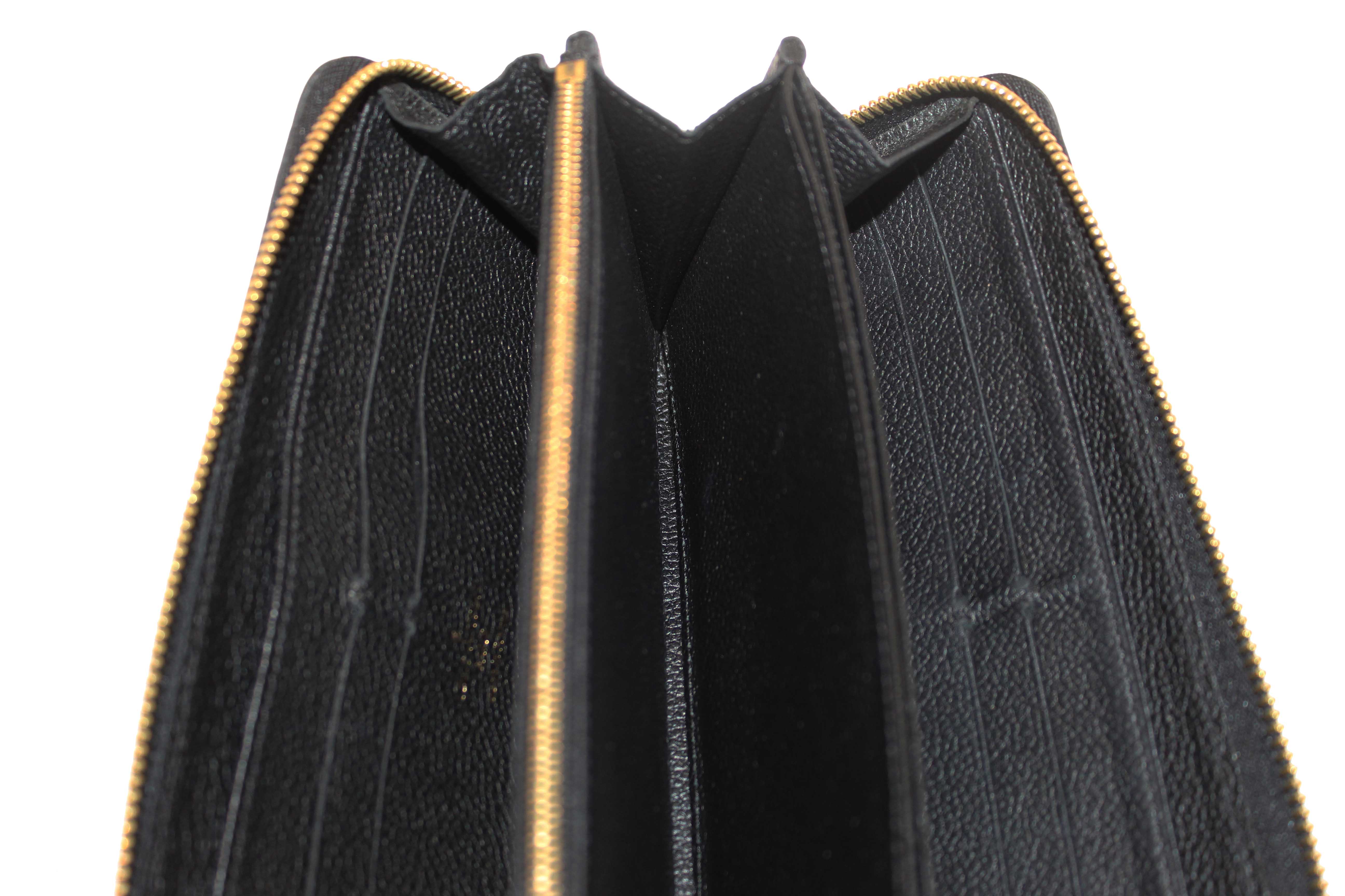 Authentic Louis Vuitton Black Monogram Empreinte Leather Zippy Wallet