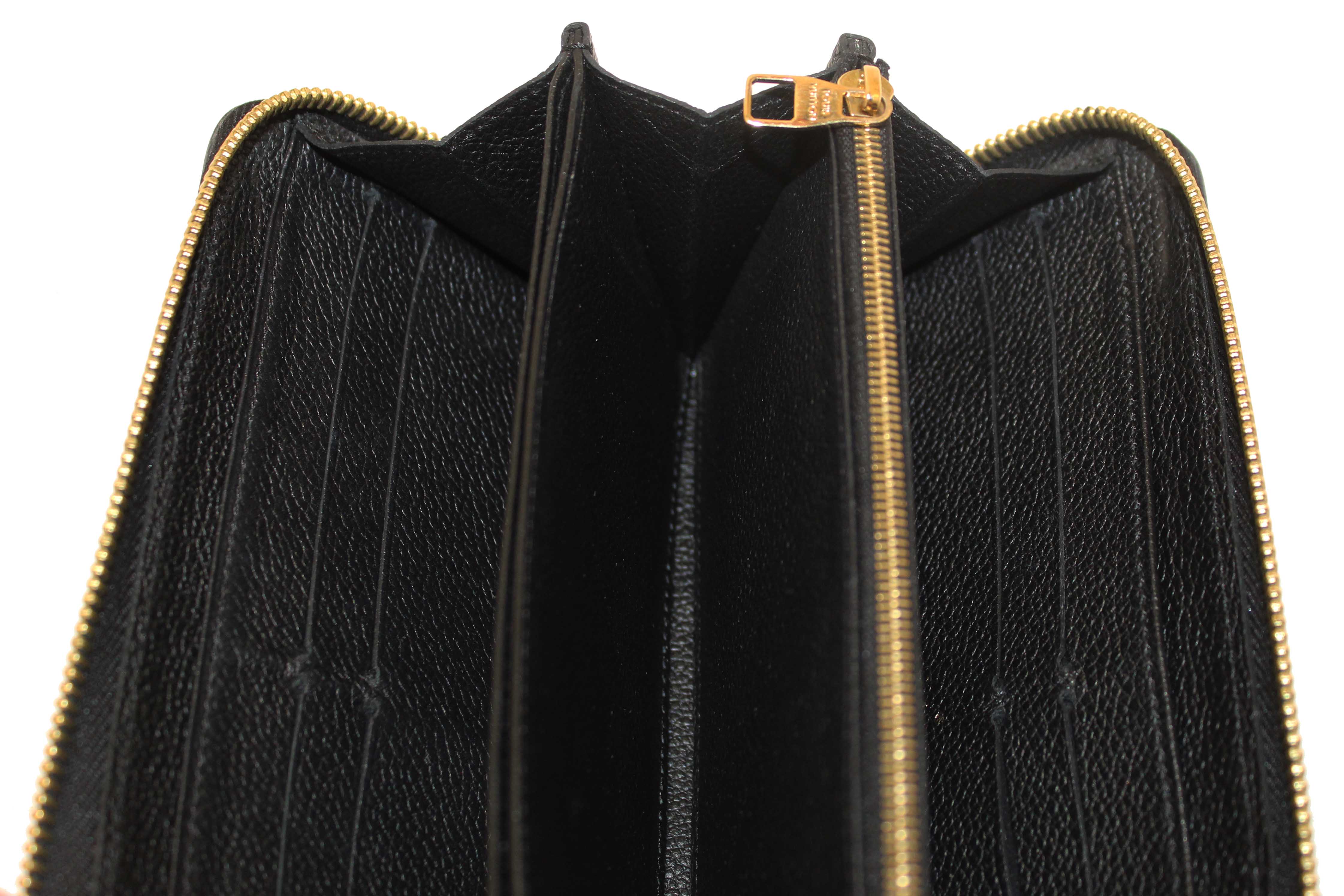 Authentic Louis Vuitton Black Monogram Empreinte Leather Zippy Wallet