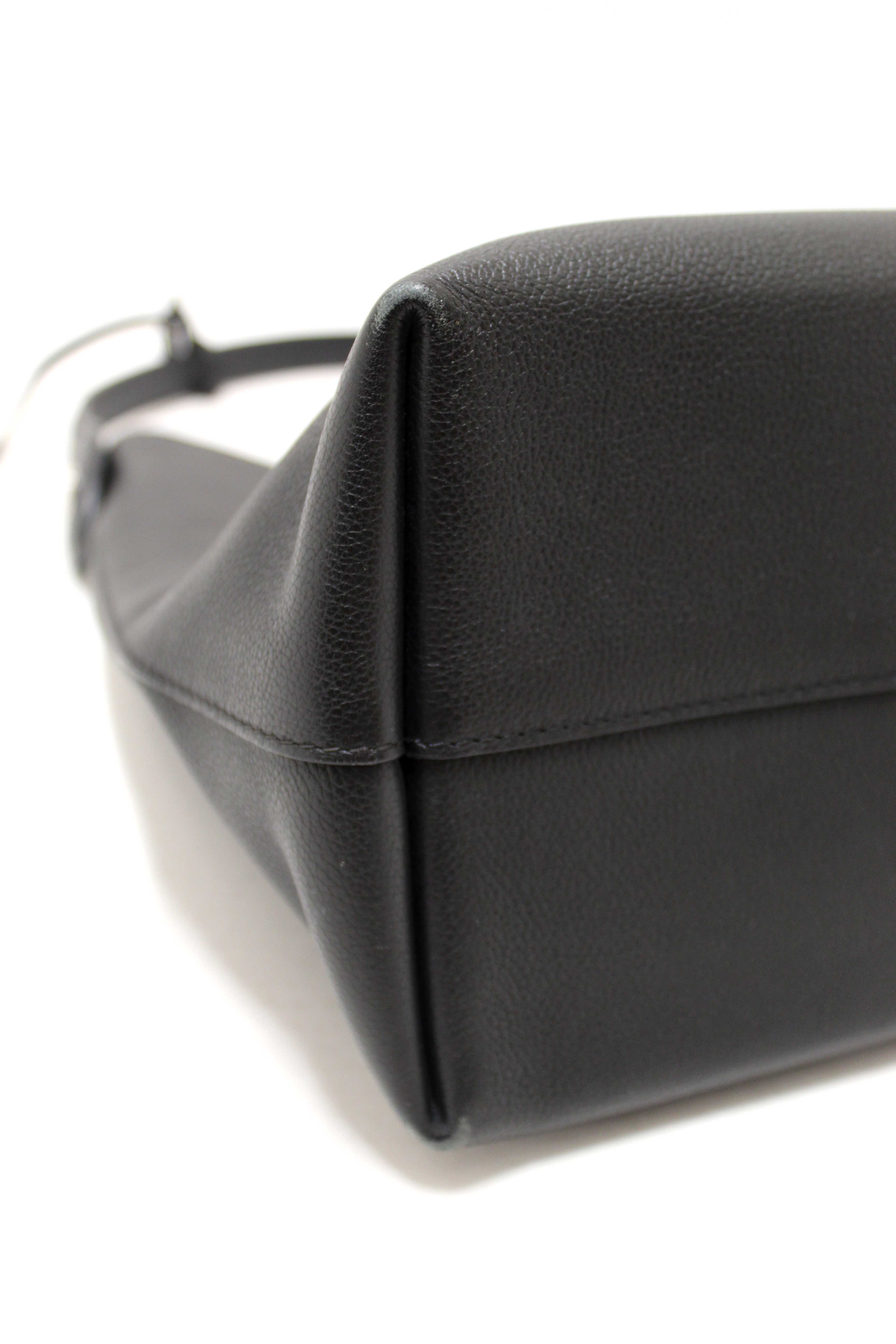 Authentic Louis Vuitton Black Grained Calf Leather Lockme Hobo Bag