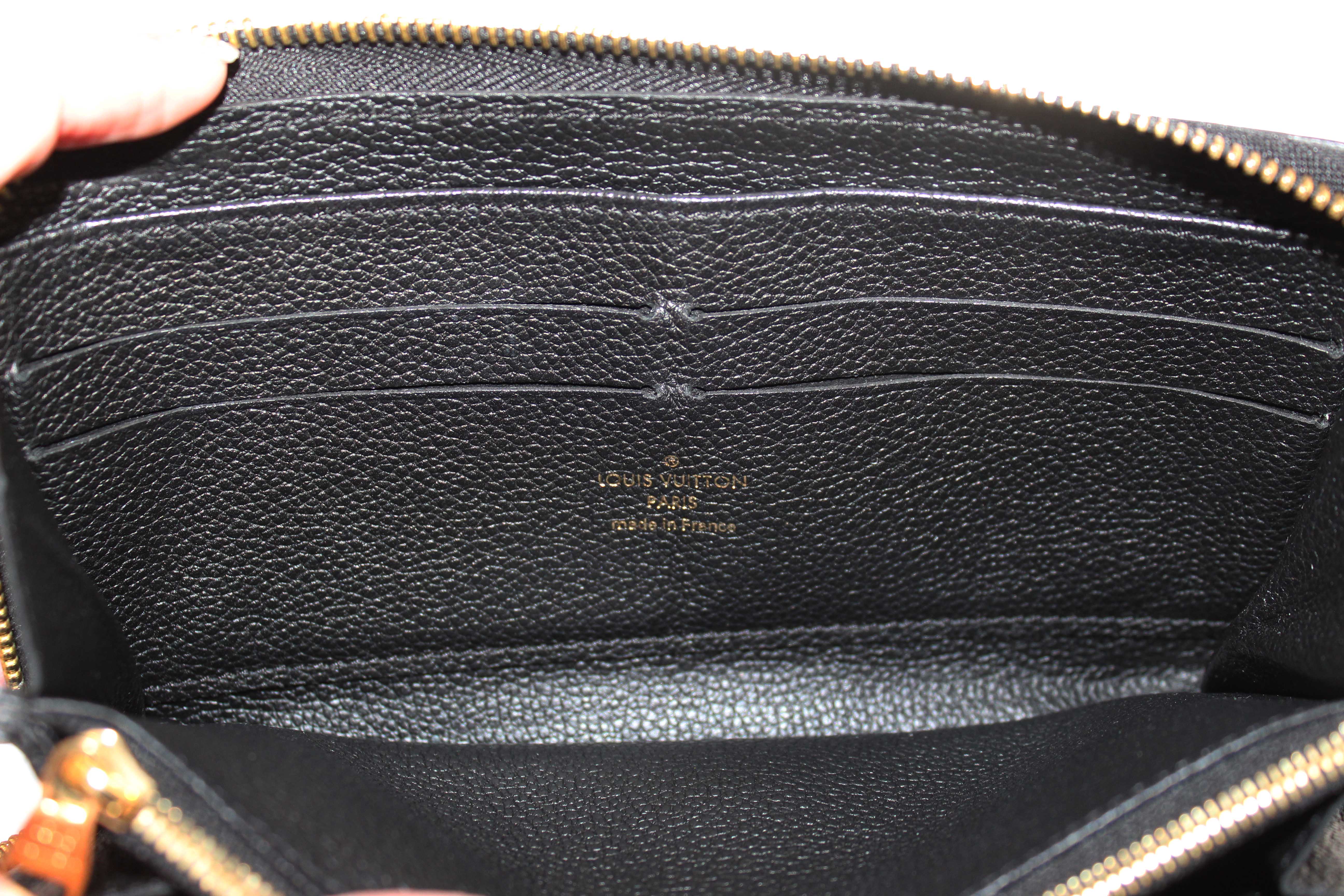 Authentic Louis Vuitton Black Monogram Empreinte Leather Zippy Wallet