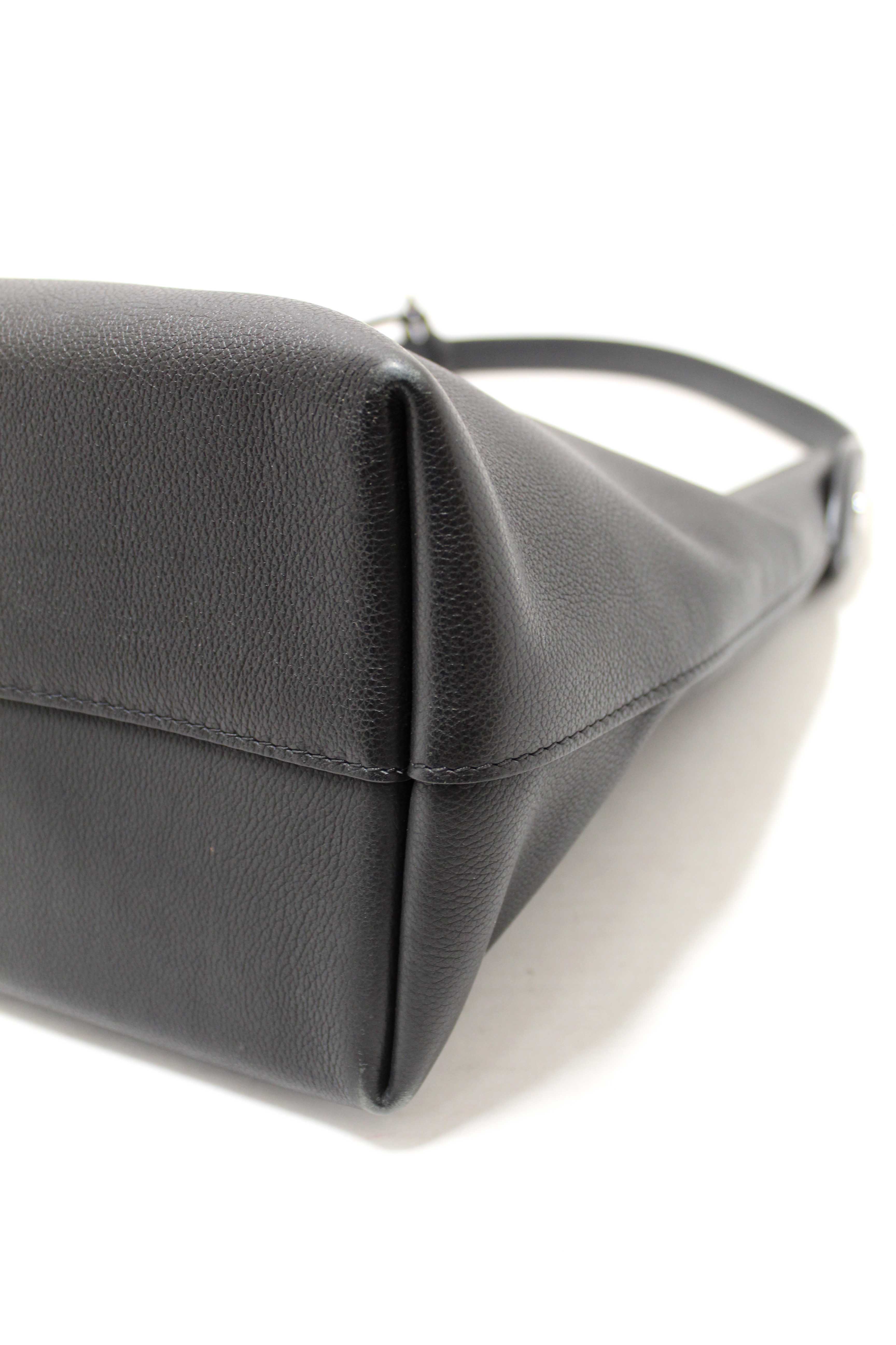 Authentic Louis Vuitton Black Grained Calf Leather Lockme Hobo Bag