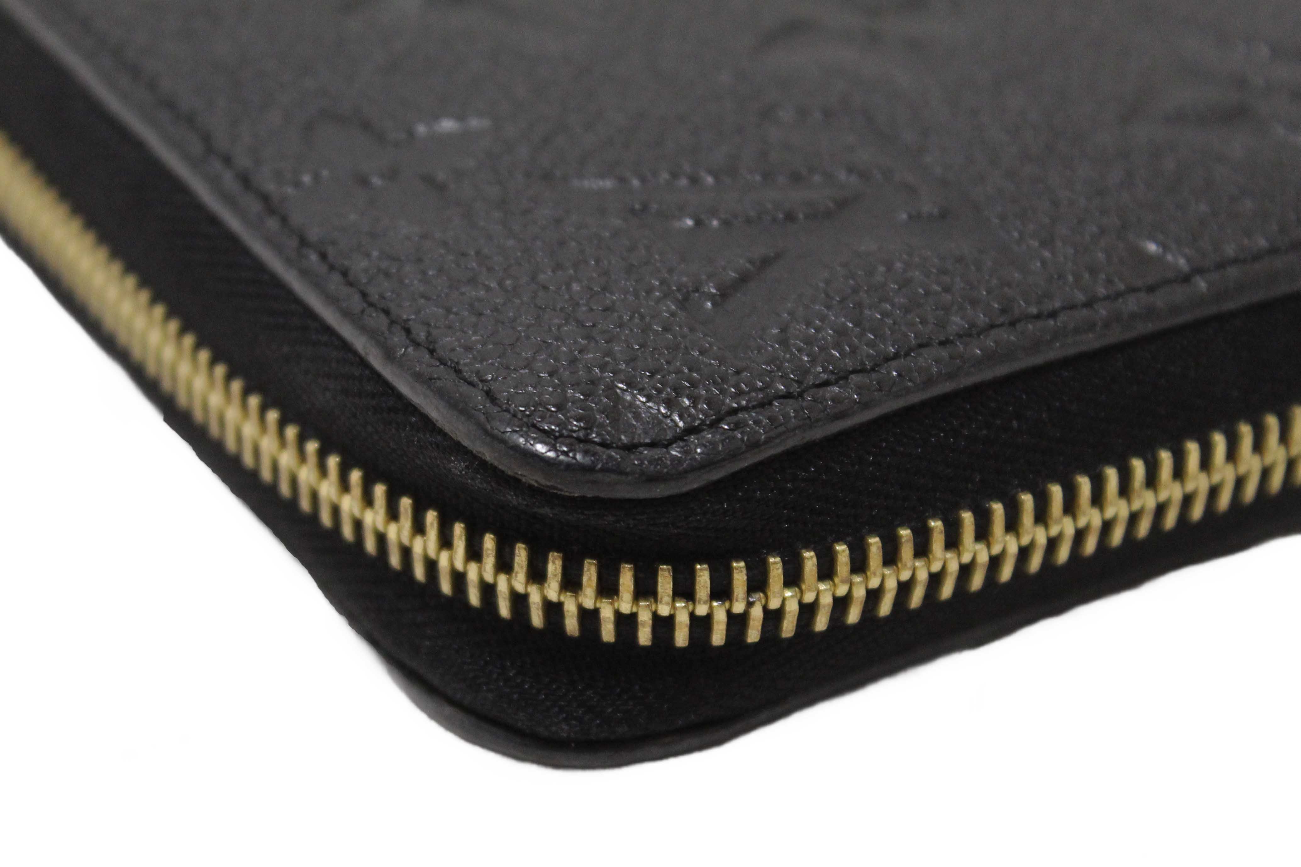 Authentic Louis Vuitton Black Monogram Empreinte Leather Zippy Wallet