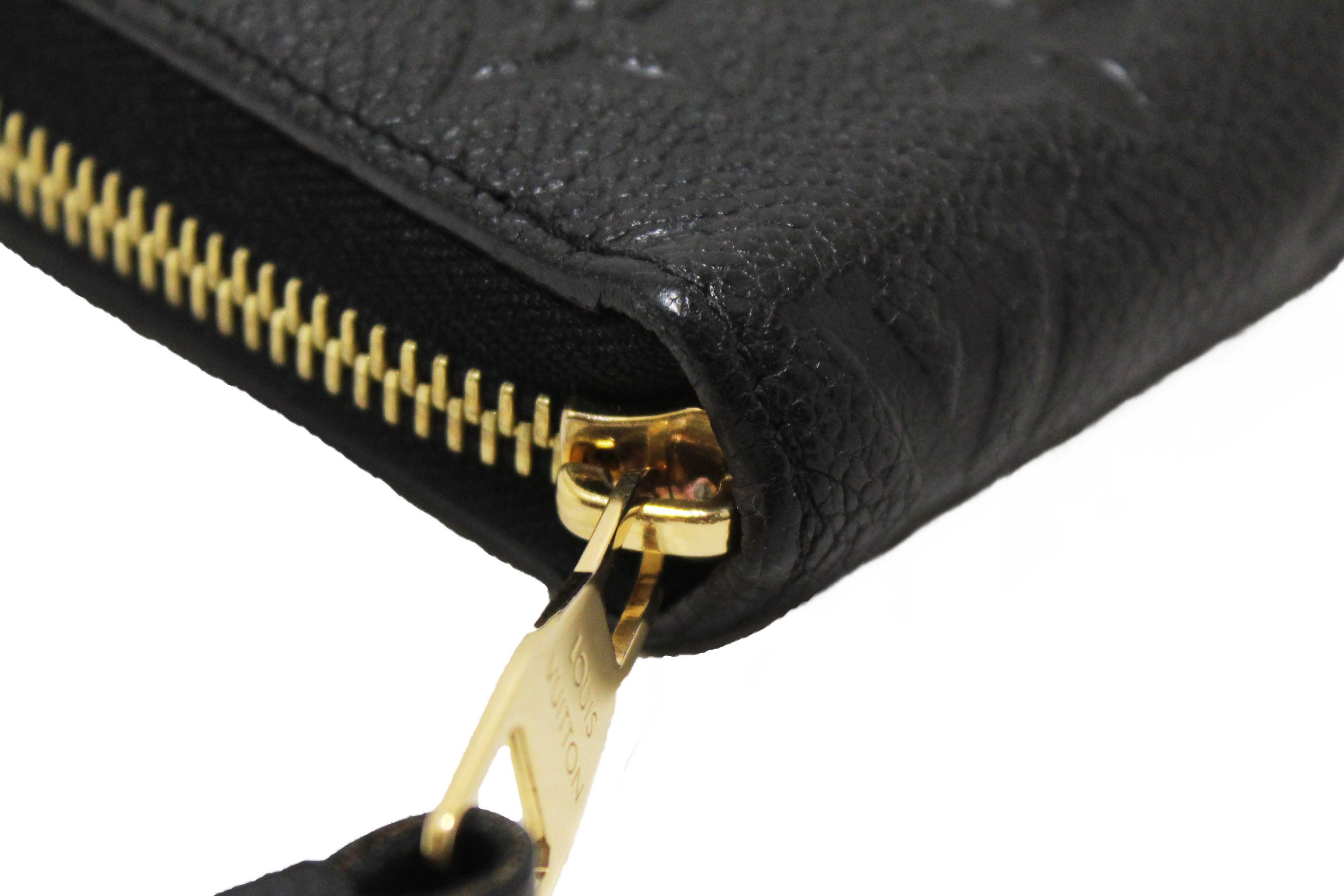 Authentic Louis Vuitton Black Monogram Empreinte Leather Zippy Wallet