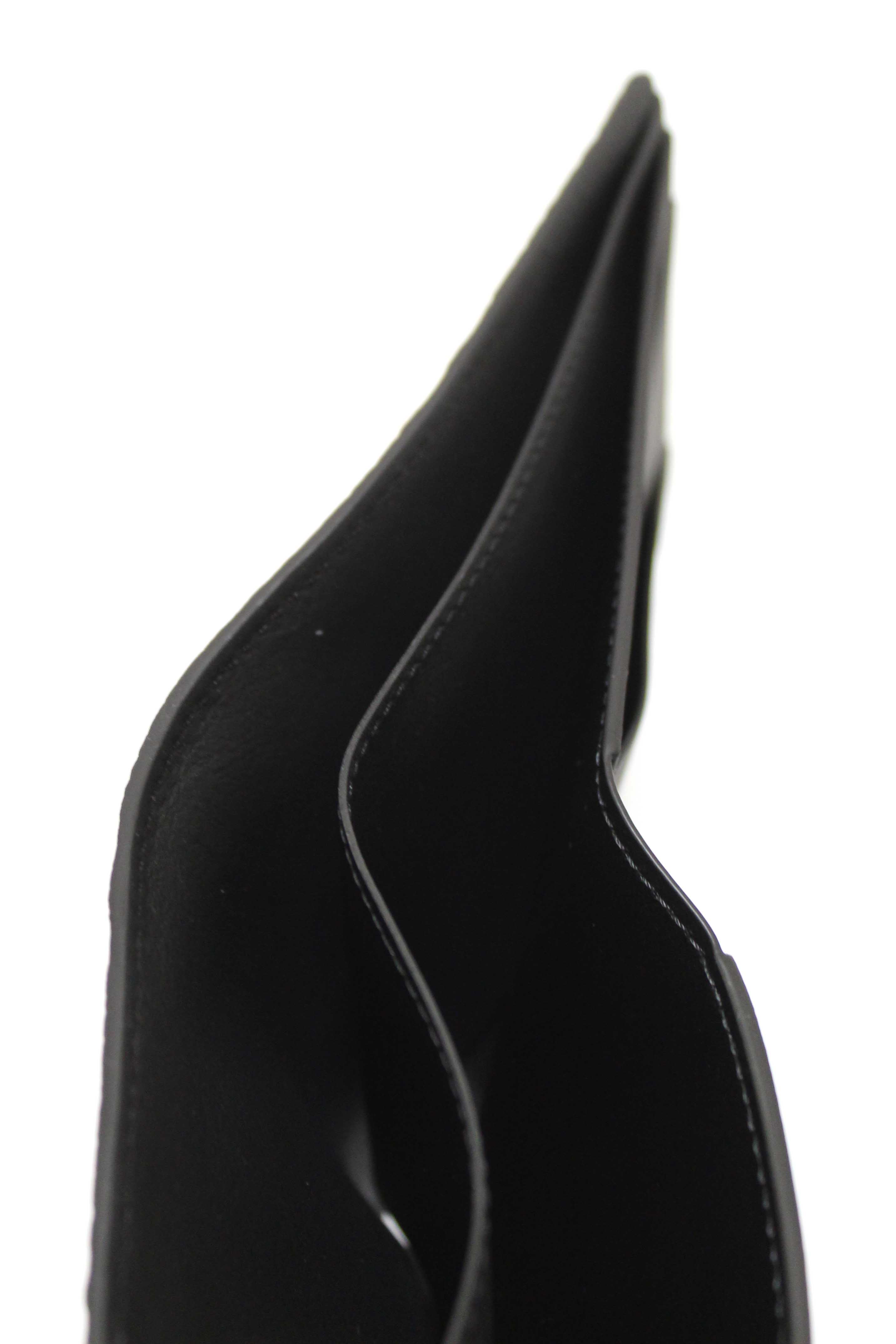 NEW Authentic Louis Vuitton Black Embossed Taurillon Multiple Bifold Wallet