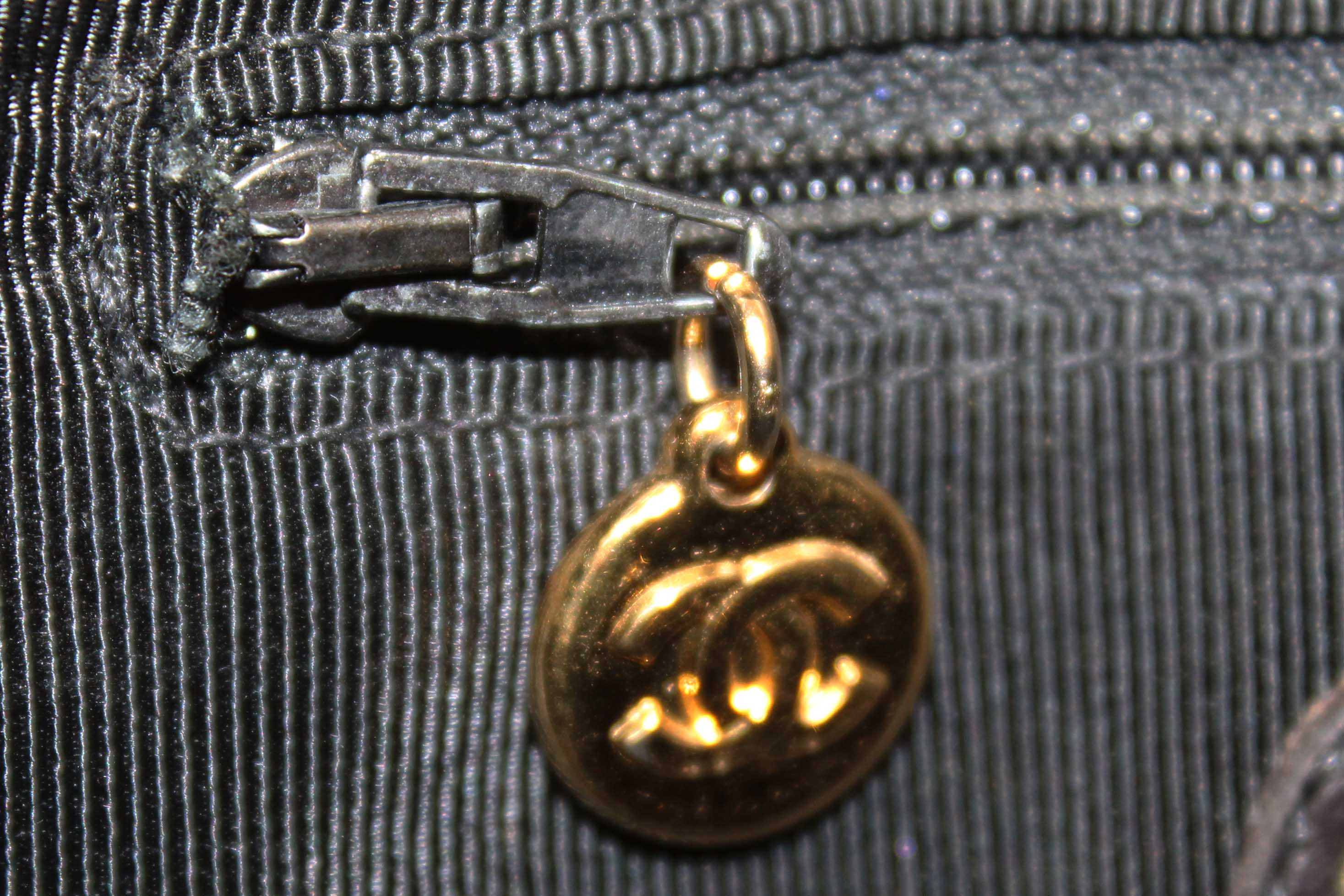 Authentic Chanel Black Caviar Leather Mini Drawstring Bucket Crossbody Bag