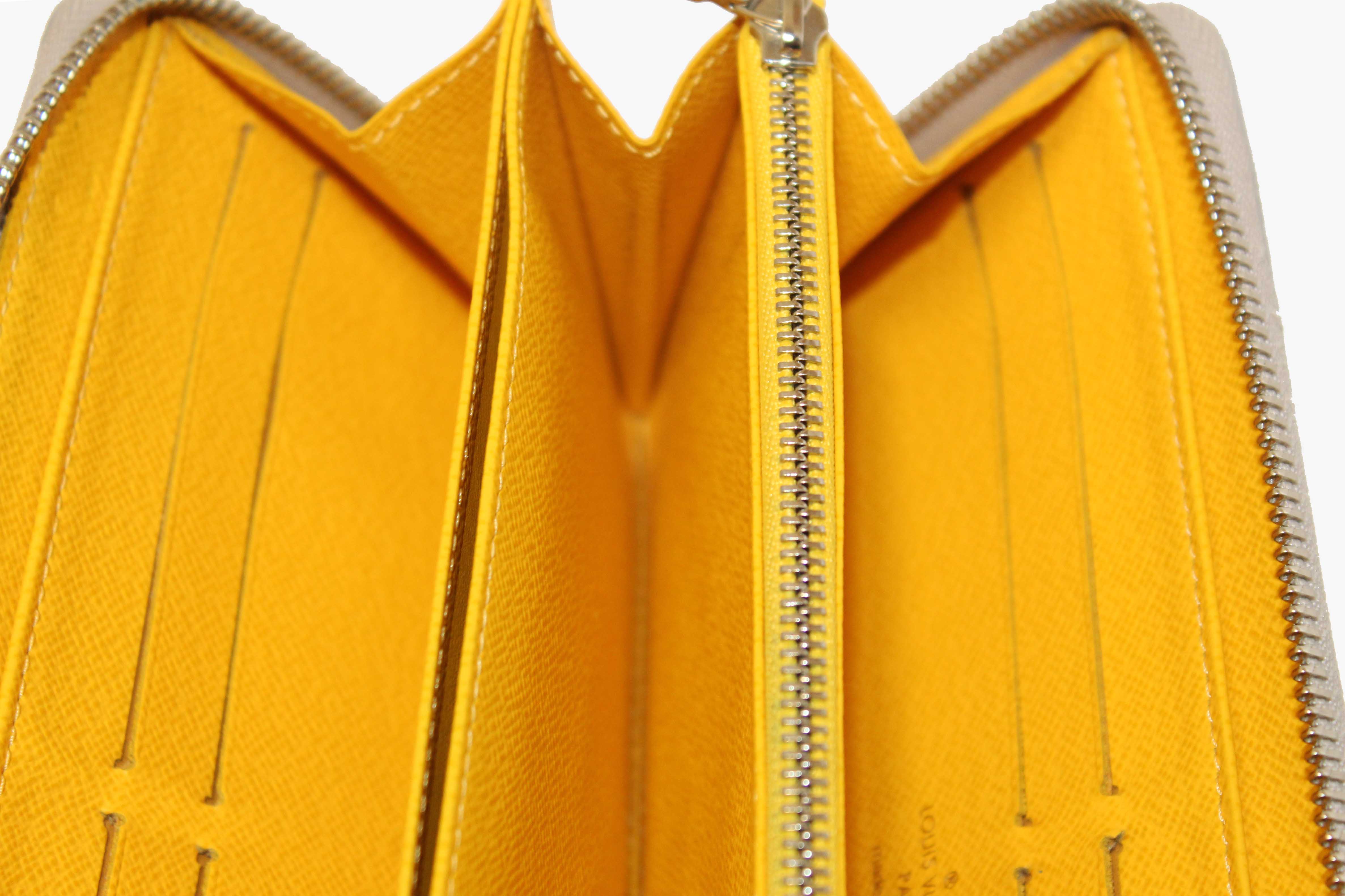 Authentic Louis Vuitton Grey Epi Leather Zippy Wallet