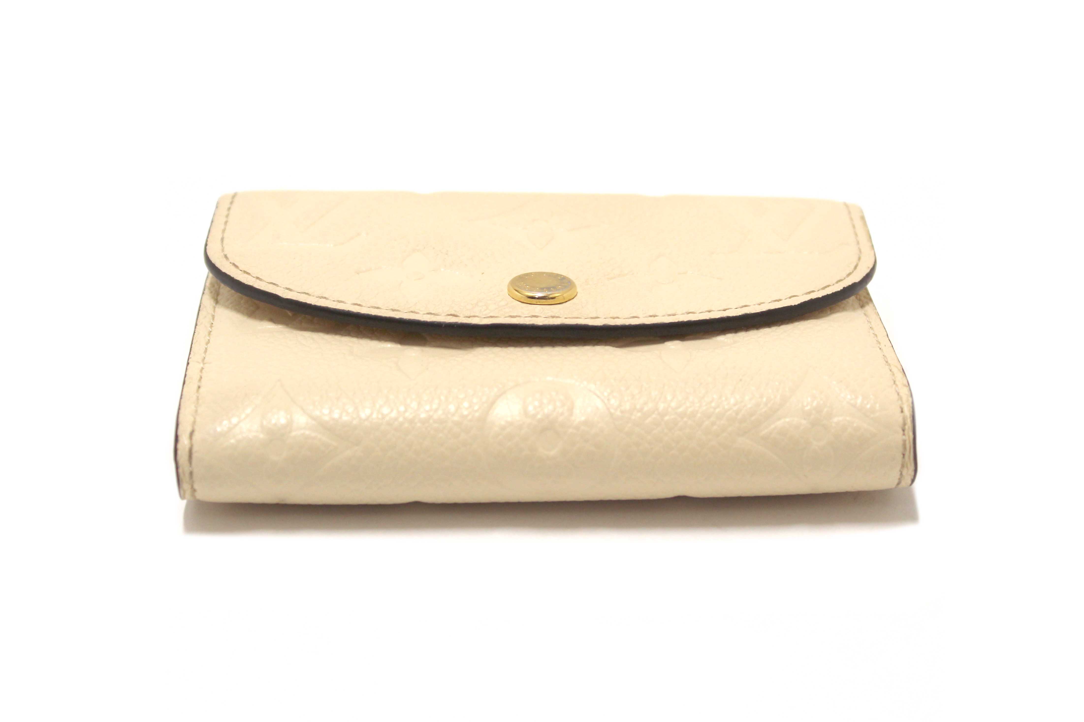 Authentic Louis Vuitton Crème Monogram Empreinte Leather Rosalie Coin Purse