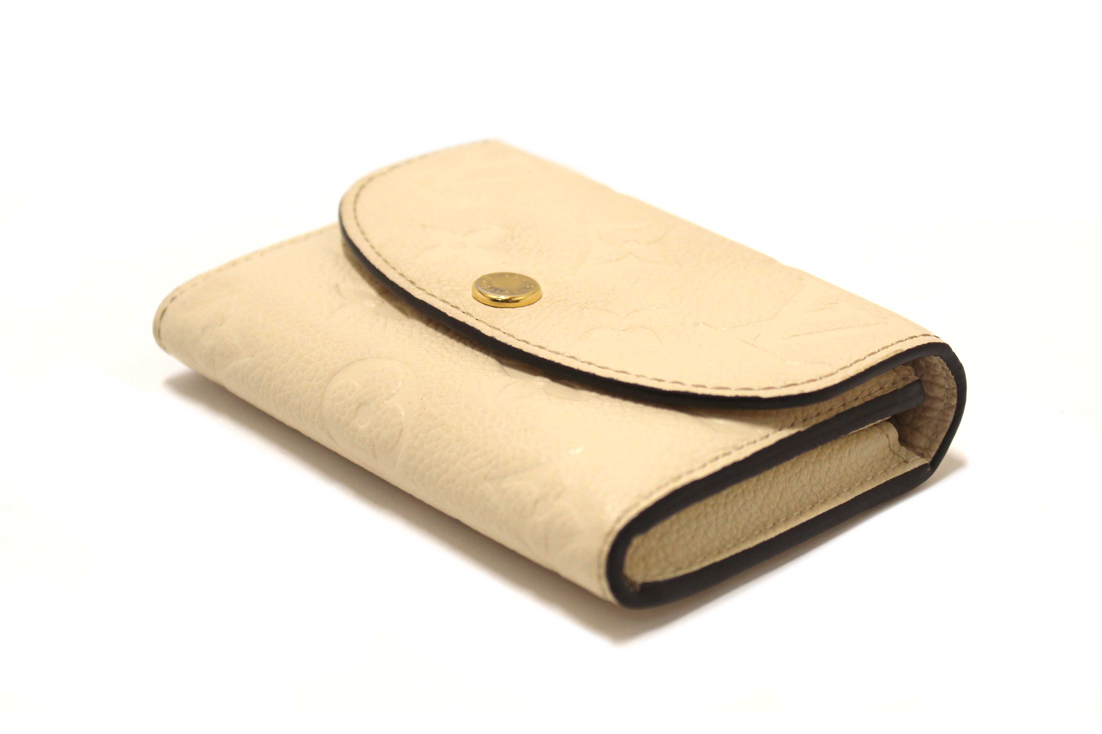Authentic Louis Vuitton Crème Monogram Empreinte Leather Rosalie Coin Purse