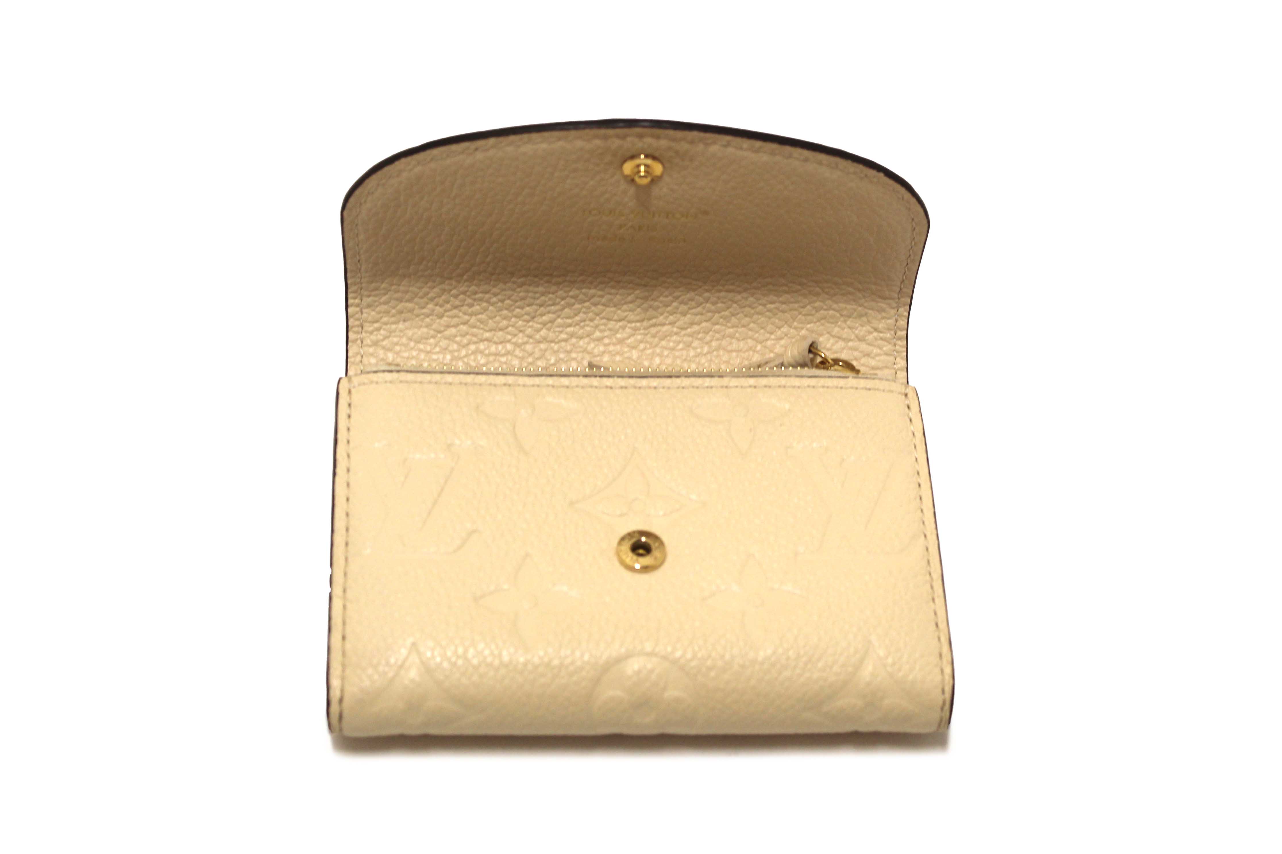 Authentic Louis Vuitton Crème Monogram Empreinte Leather Rosalie Coin Purse
