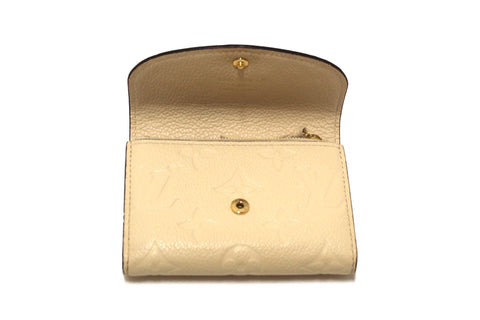 Authentic Louis Vuitton Crème Monogram Empreinte Leather Rosalie Coin Purse