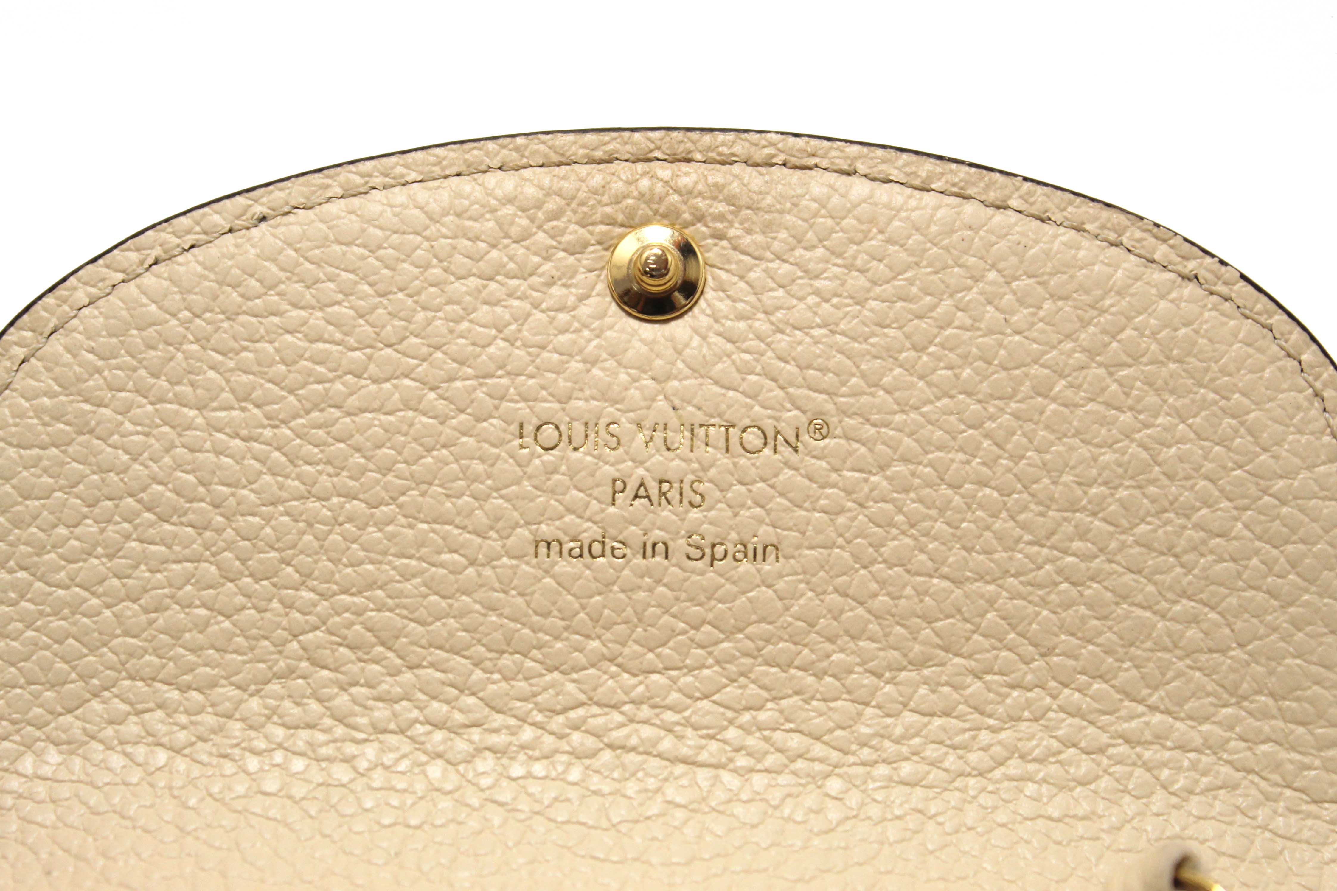 Authentic Louis Vuitton Crème Monogram Empreinte Leather Rosalie Coin Purse