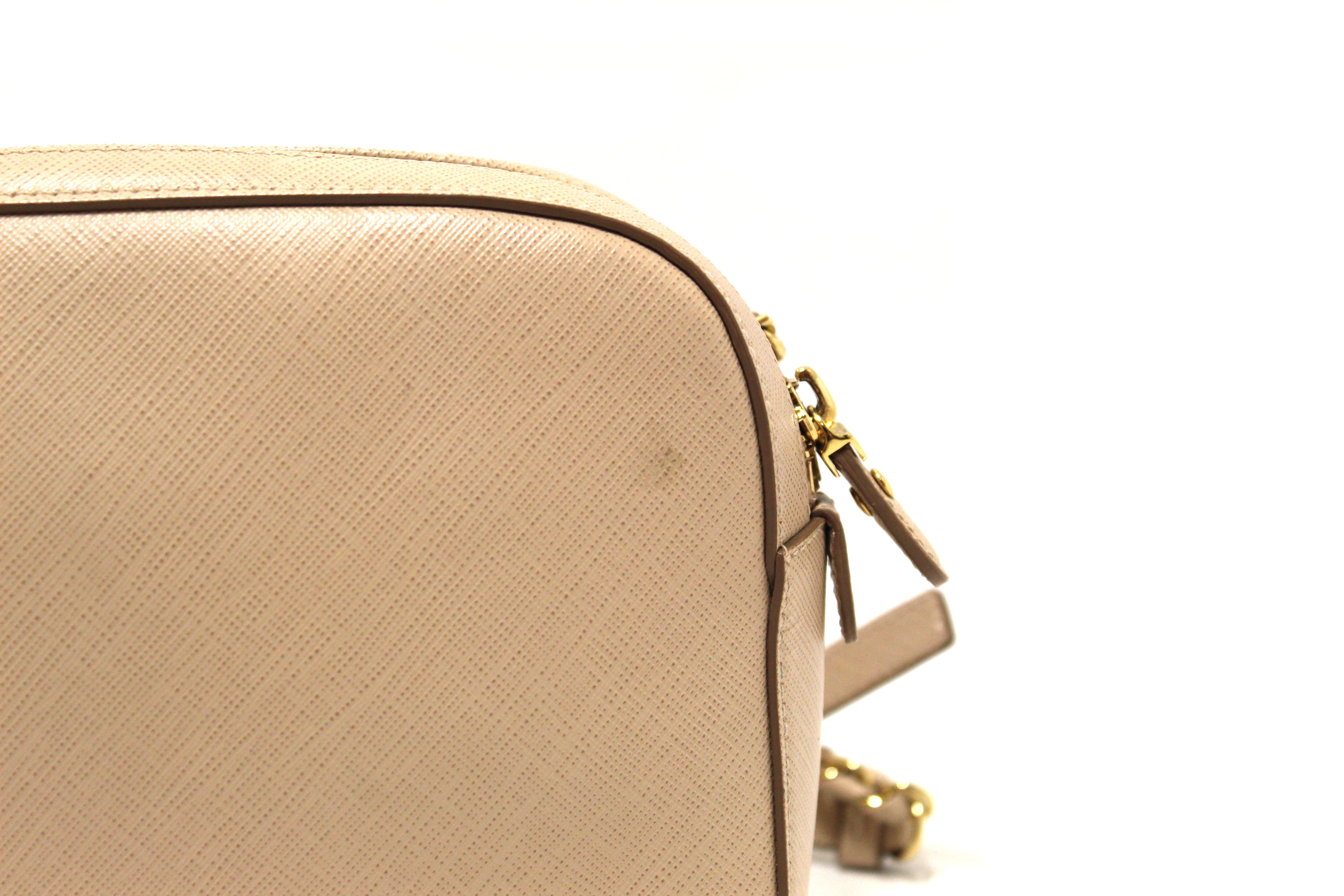 Authentic Salvatore Ferragamo Beige Calfskin Leather Lydia Bow Camera Crossbody Bag