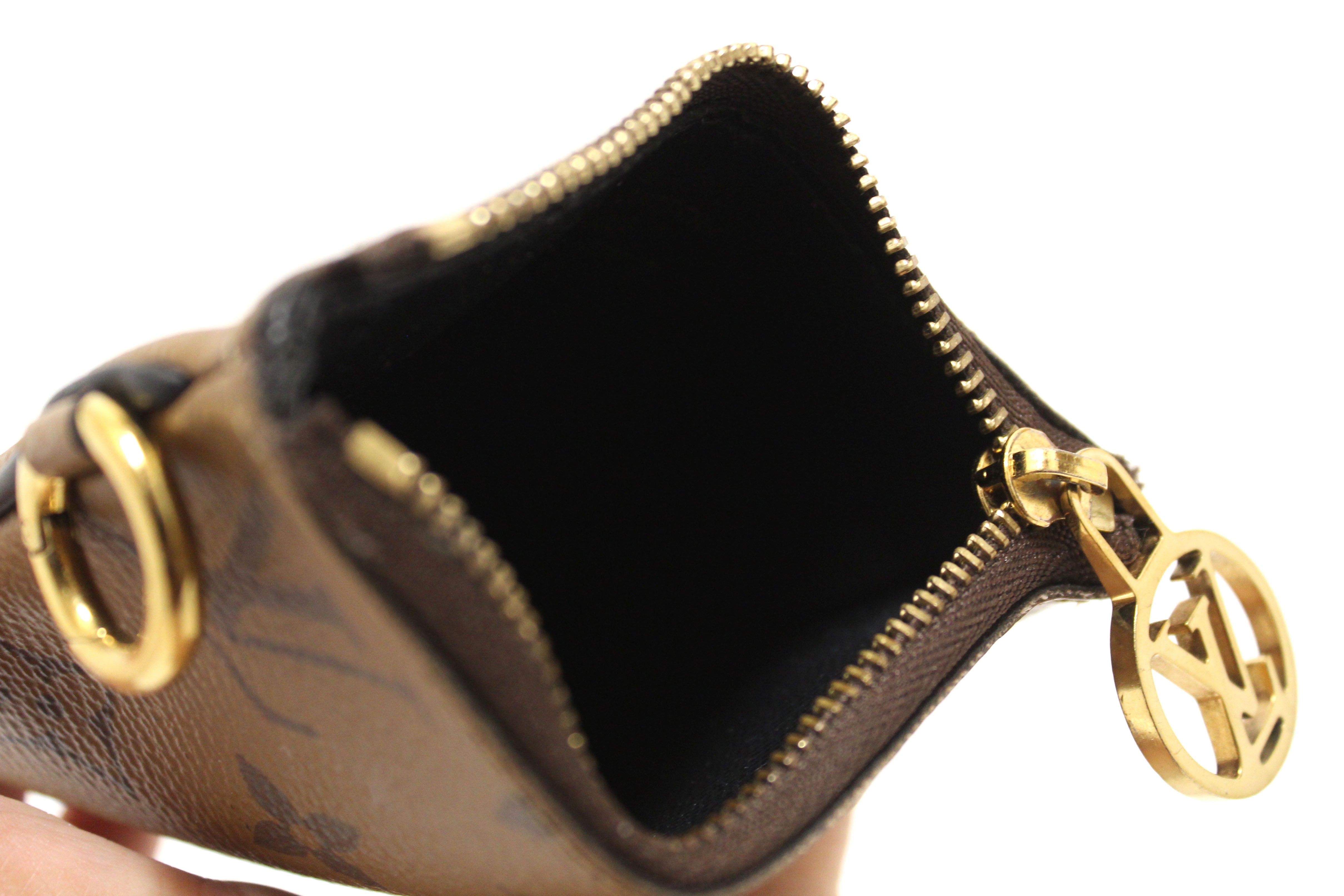 Authentic Louis Vuitton Monogram Giant/Monogram Reverse Canvas Trio Pouch