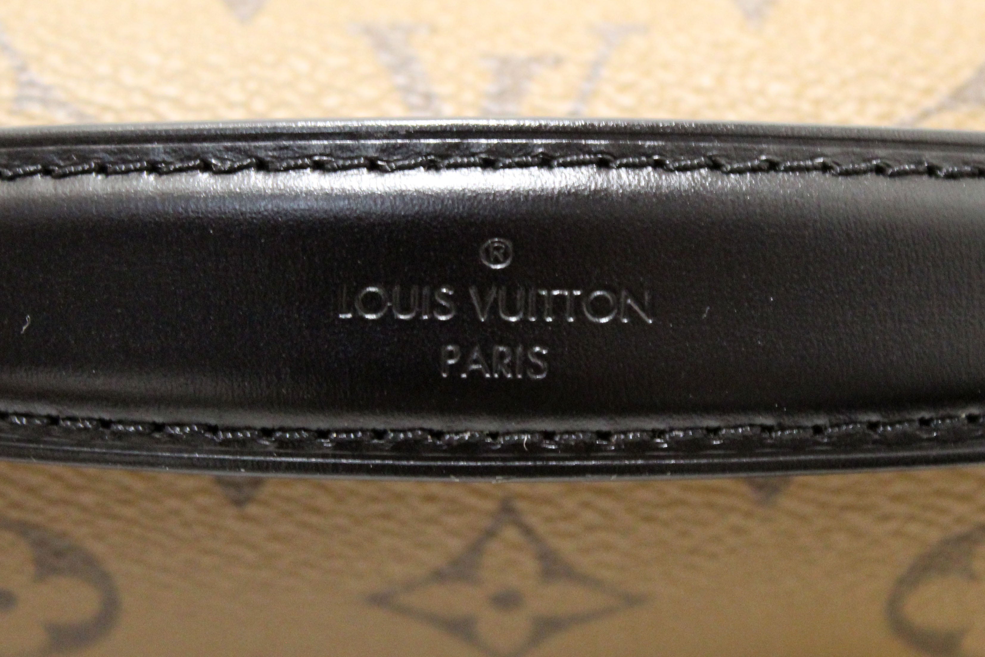Authentic Louis Vuitton Classic Monogram Reverse Canvas Pochette