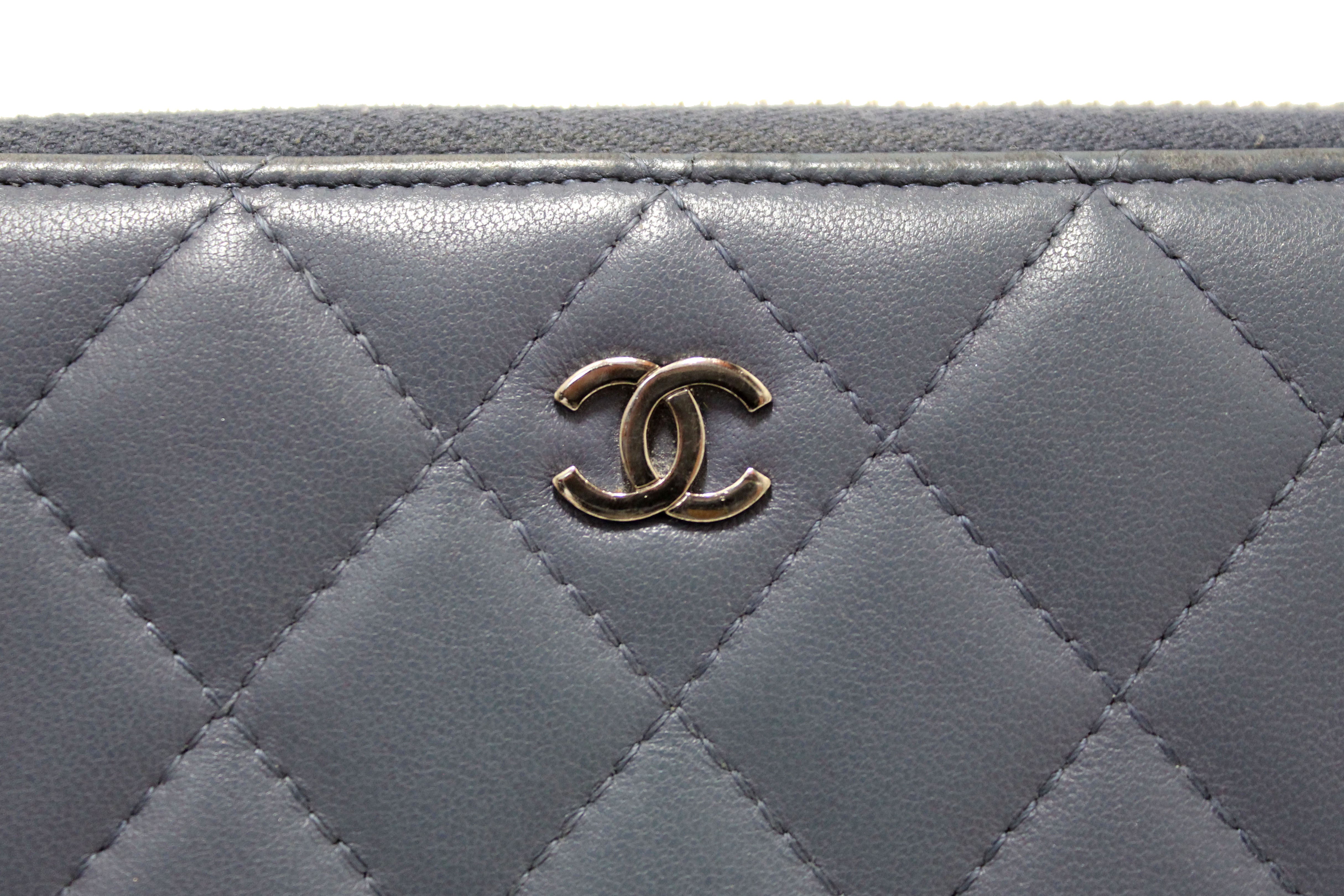 Authentic Chanel Blue Quilted Lambskin Leather Zippy Wallet
